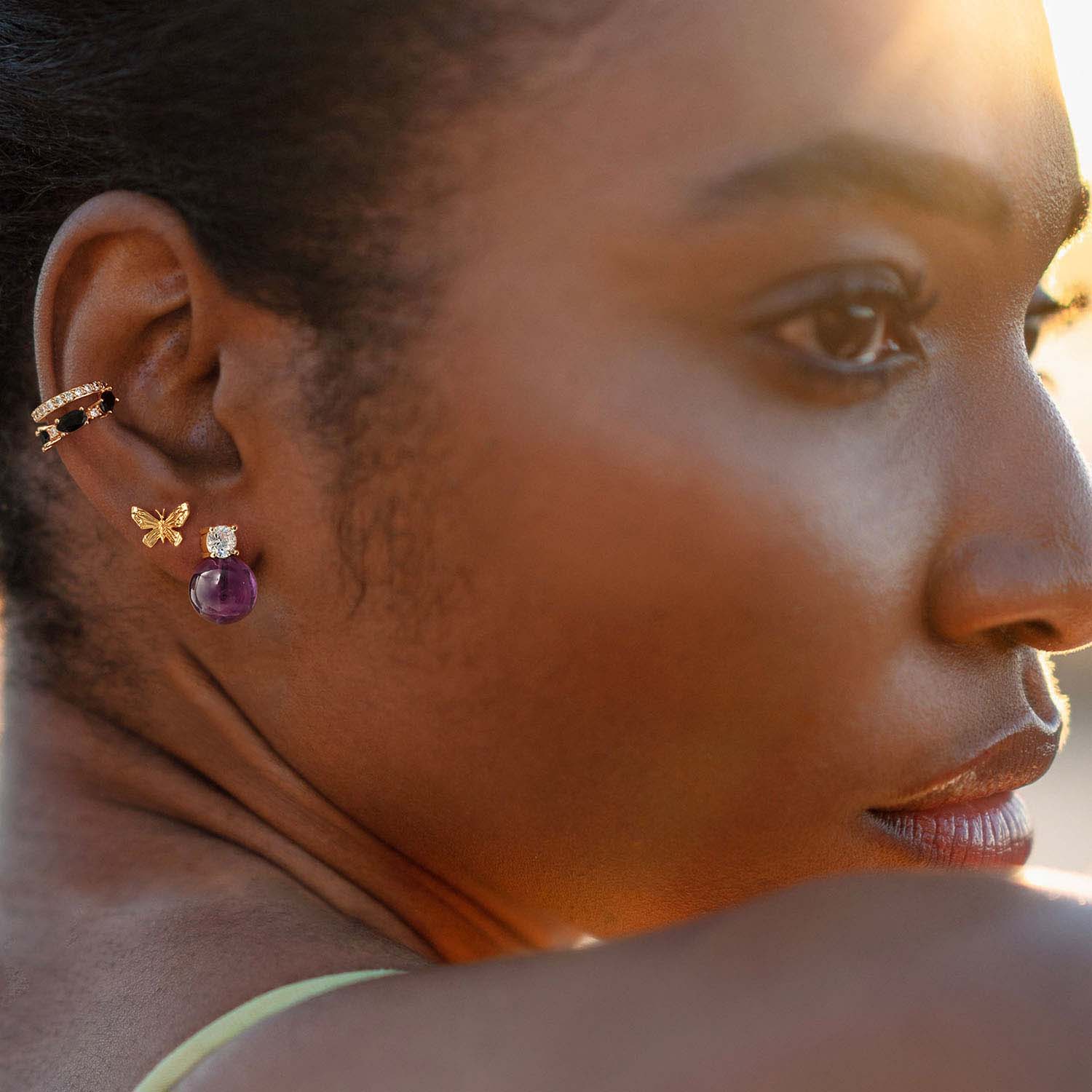 Close-up of a model wearing MYEARS® Amethyst Bead Ball Stud Earrings, 14K gold, showcasing natural amethyst gemstones, elegant jewelry for women, perfect gift idea.