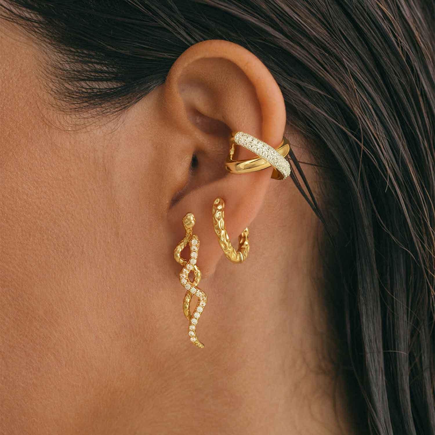 Lifestyle image of MYEARS® gold hammered hoop earrings styled for women’s everyday wear and modern gift occasions