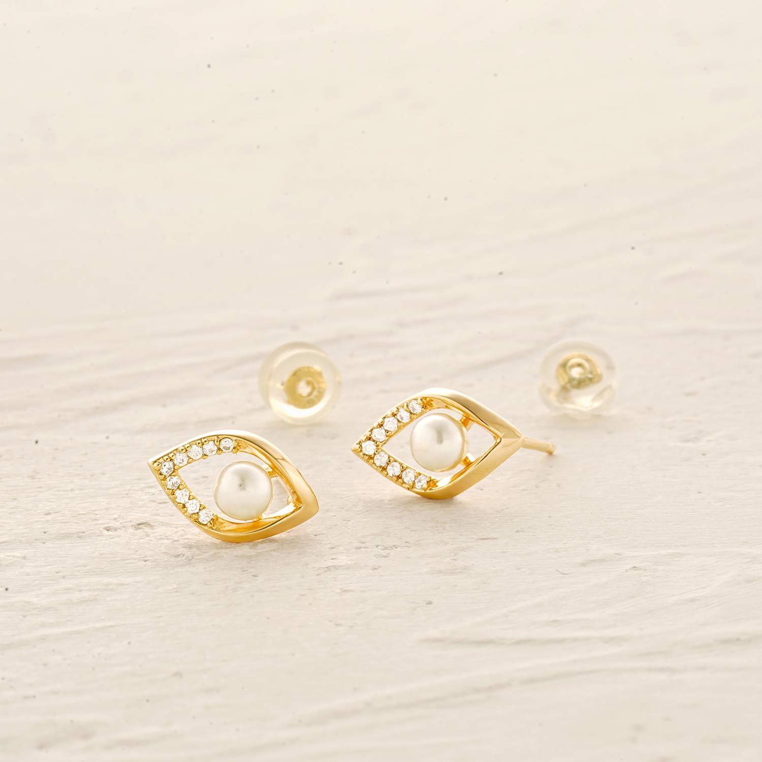 Detailed view of MYEARS® evil eye pearl stud earrings showing the evil eye design and pearl detail craftsmanship.