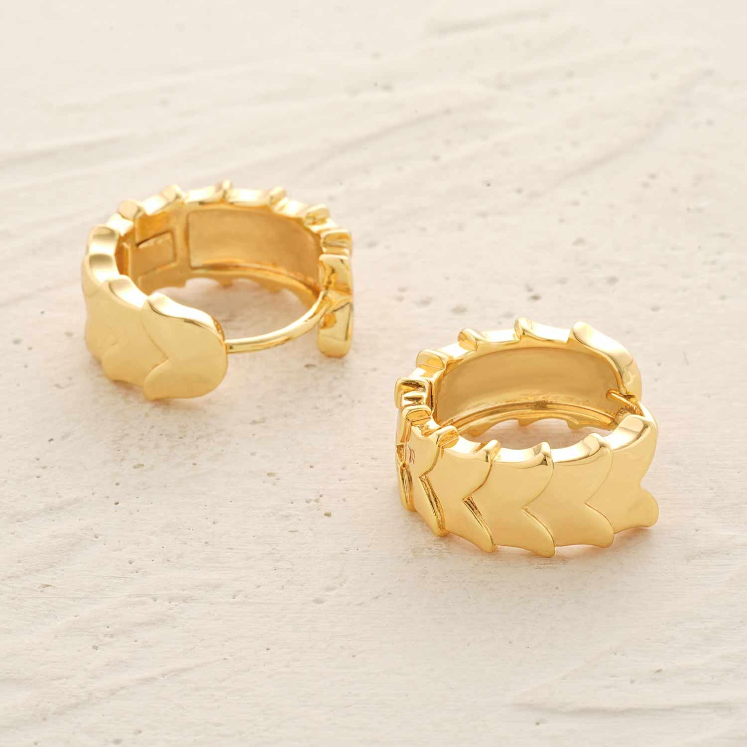 Detailed view of MYEARS® overlapping butterfly huggie hoop earrings, gold-plated layered design, highlighting elegant craftsmanship for women, ideal gift jewelry.