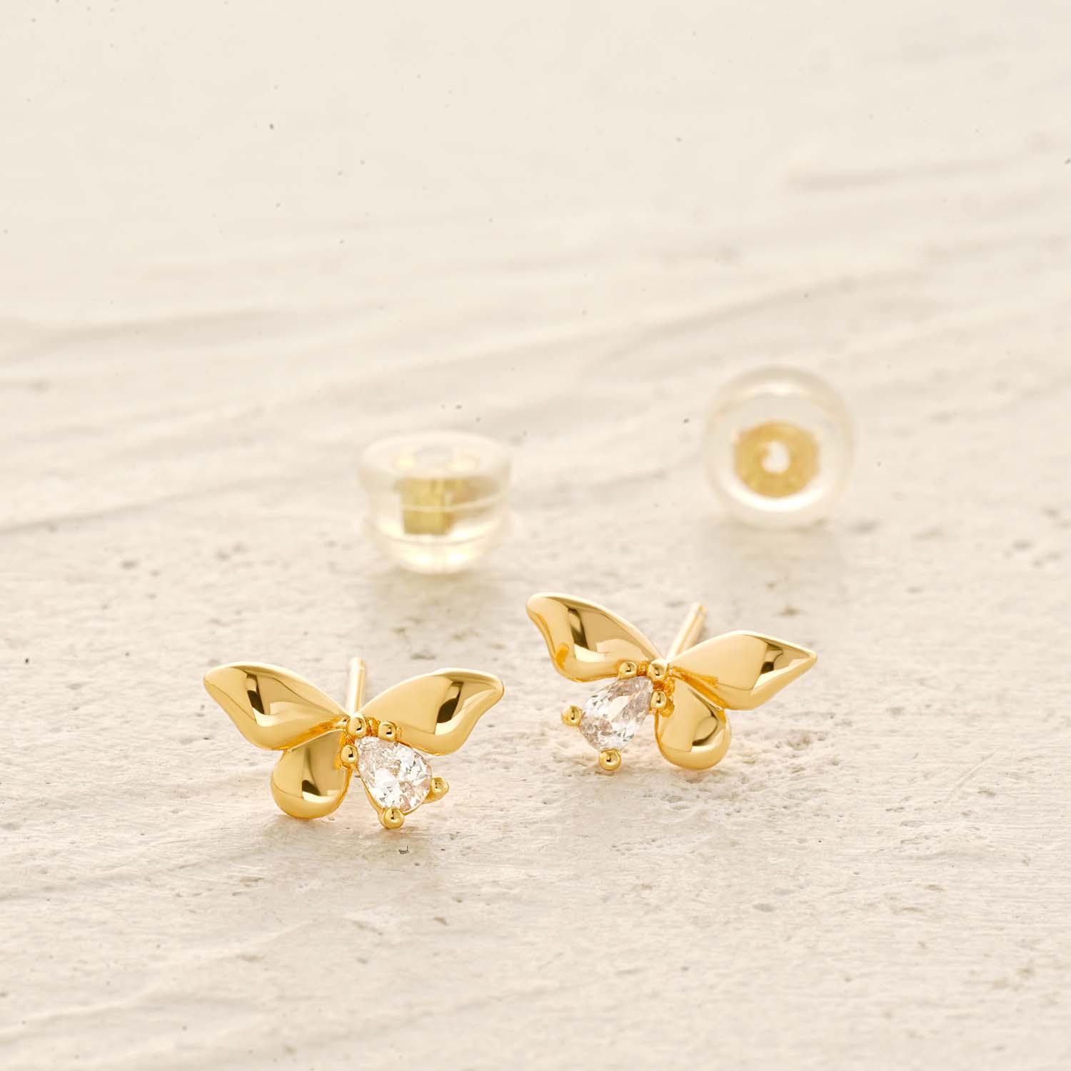 Detailed view of MYEARS® gold bow stud earrings, showing craftsmanship and delicate bow design, perfect jewelry gift for women.