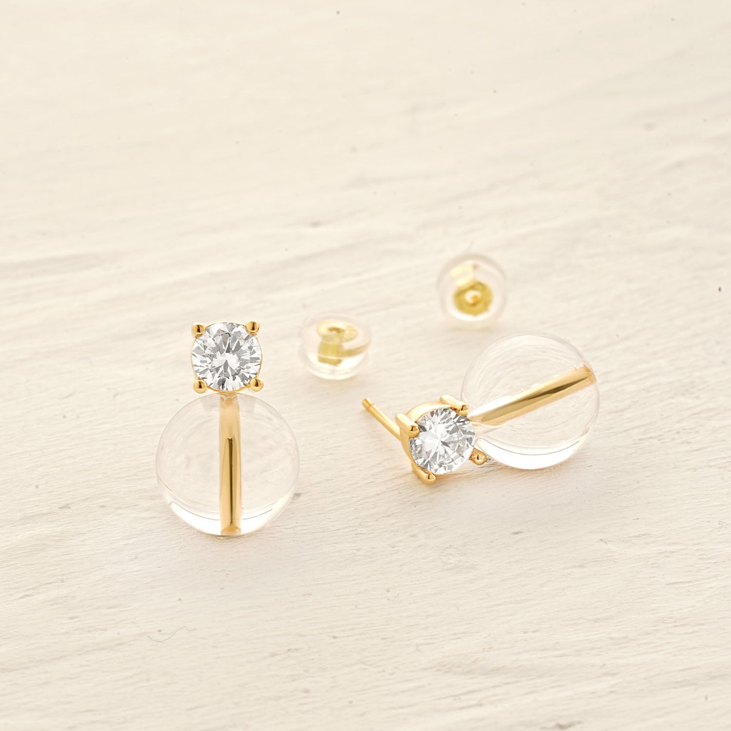 Detailed view of MYEARS® White Crystal Bead Ball Stud Earrings, highlighting sparkling crystal gemstones and 14K gold finish, perfect as gift or personal collection.