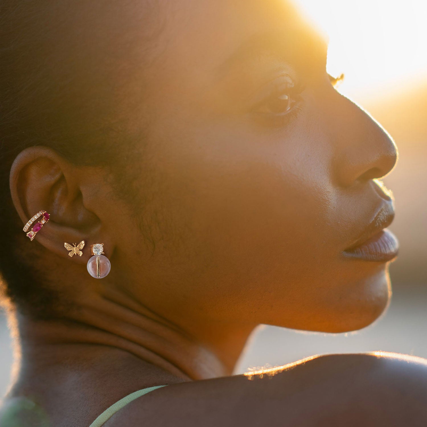 Model wearing MYEARS® White Crystal Bead Ball Stud Earrings, 14K gold stud earrings for women, sparkling crystal gemstones, stylish and versatile jewelry for everyday wear.