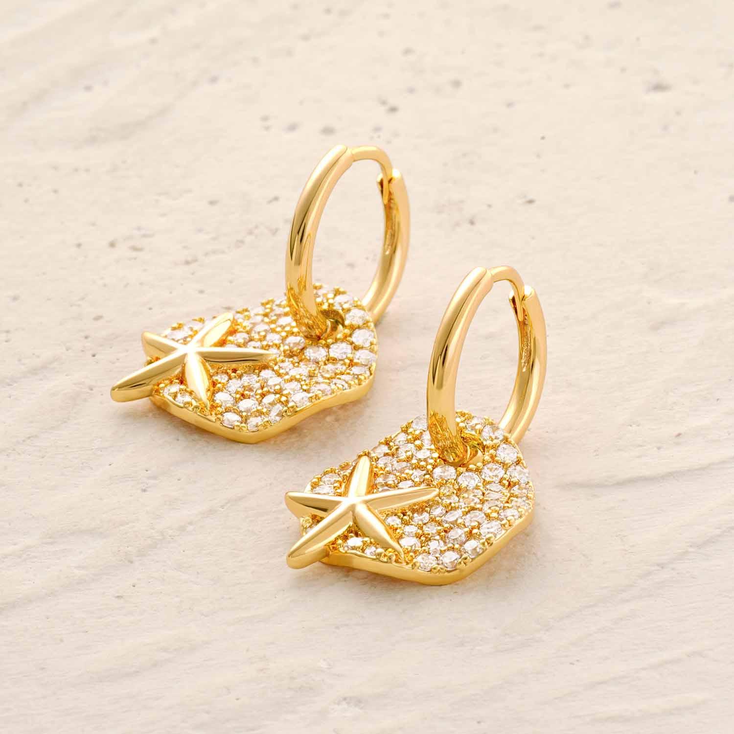 Detailed view of Starfish Dangle Hoop Earrings showing gold finish and starfish design, suitable gift for women