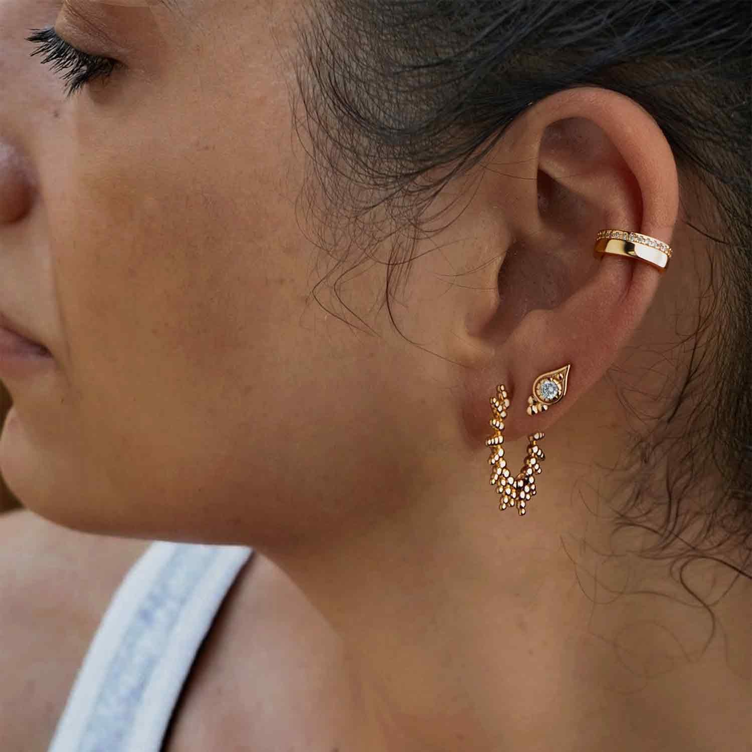 MYEARS® Gold Sunburst Beaded Huggie Hoop Earrings worn by model, stylish gold hoops for women, everyday wear