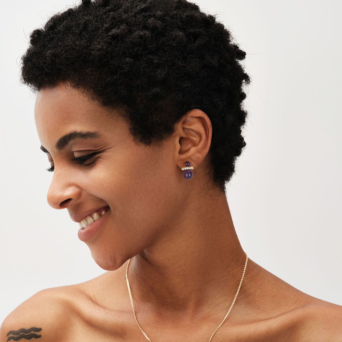 Model wearing MYEARS Amethyst Spherical Stud Earrings, stylish gold earrings for women