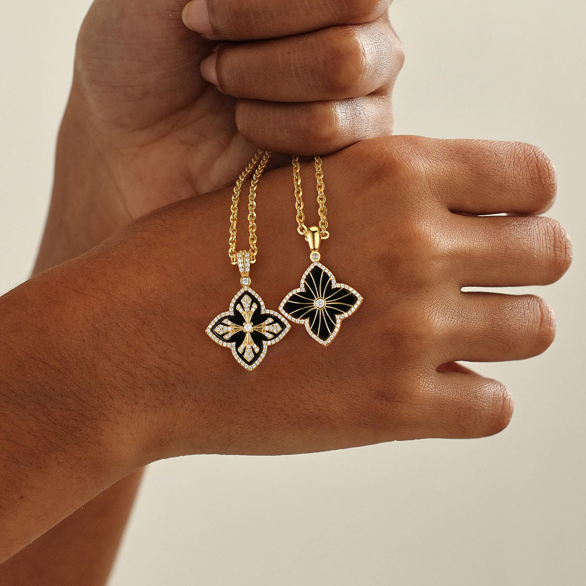 Model wearing MYEARS Black Onyx Four Leaf Clover Pendant Necklace in gold, elegant and lucky design for women, perfect for everyday wear