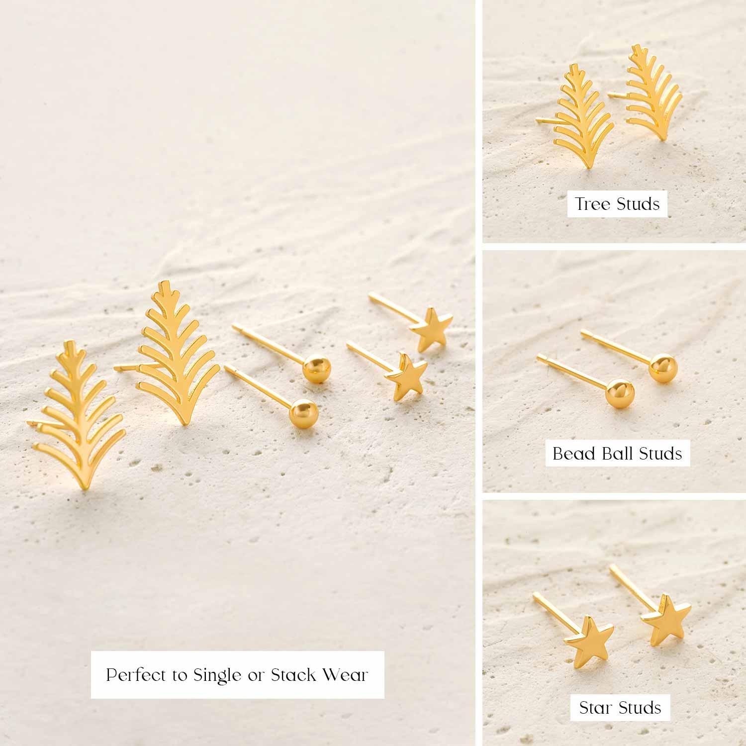 Close-up detail of MYEARS gold Christmas tree, stars, and ball stud earrings set