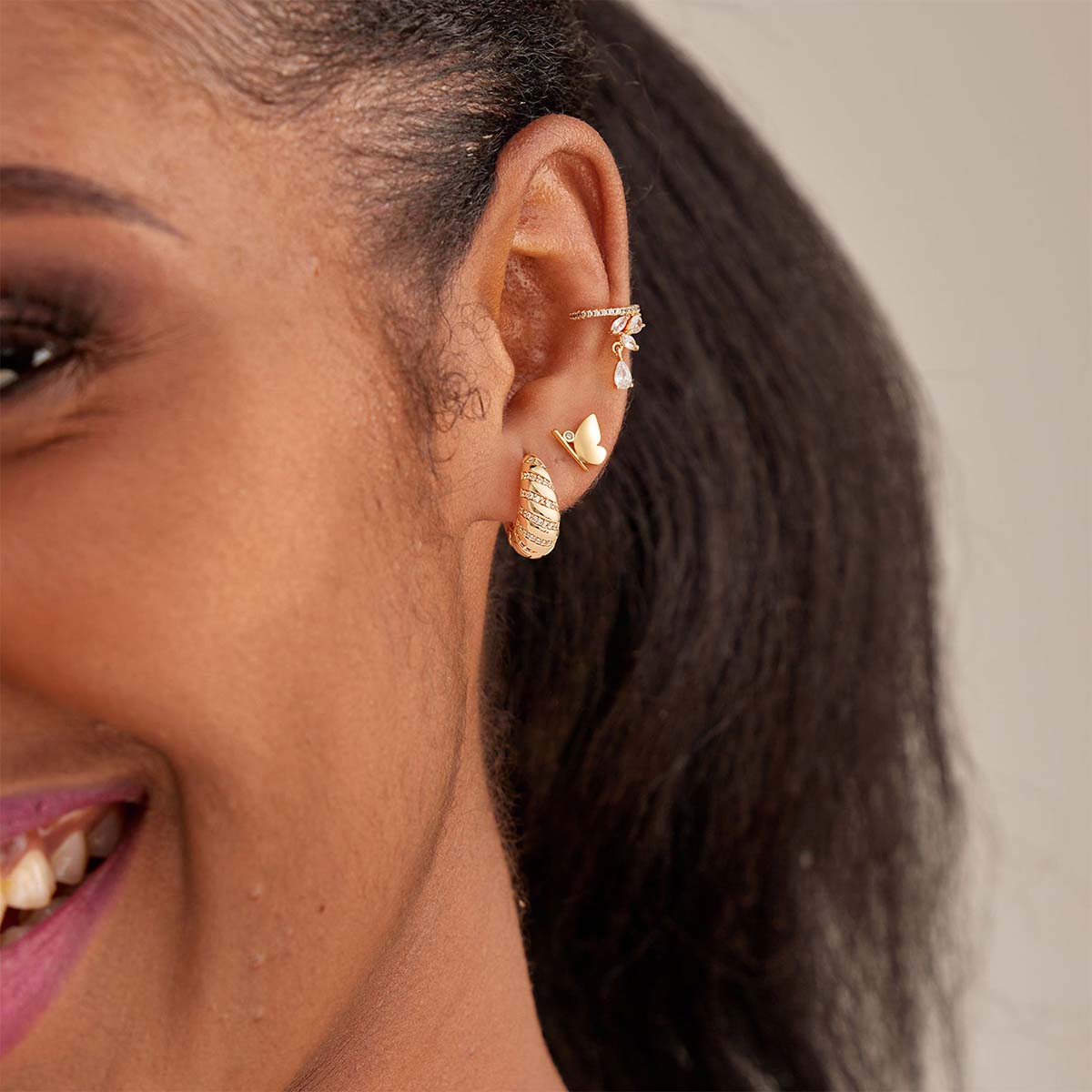 Woman wearing MYEARS® Chunky Croissant CZ Hoop Earrings in gold, showing CZ detailing suitable for daily wear and gifting