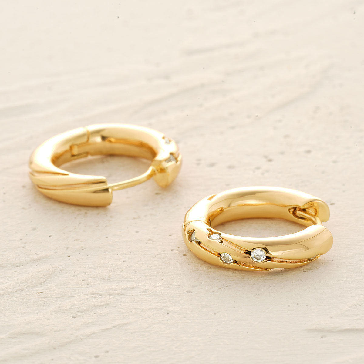 Detailed view of MYEARS® Chunky Meteor CZ Hoop Earrings in gold, highlighting cubic zirconia shine, polished finish, and unique meteor hoop texture