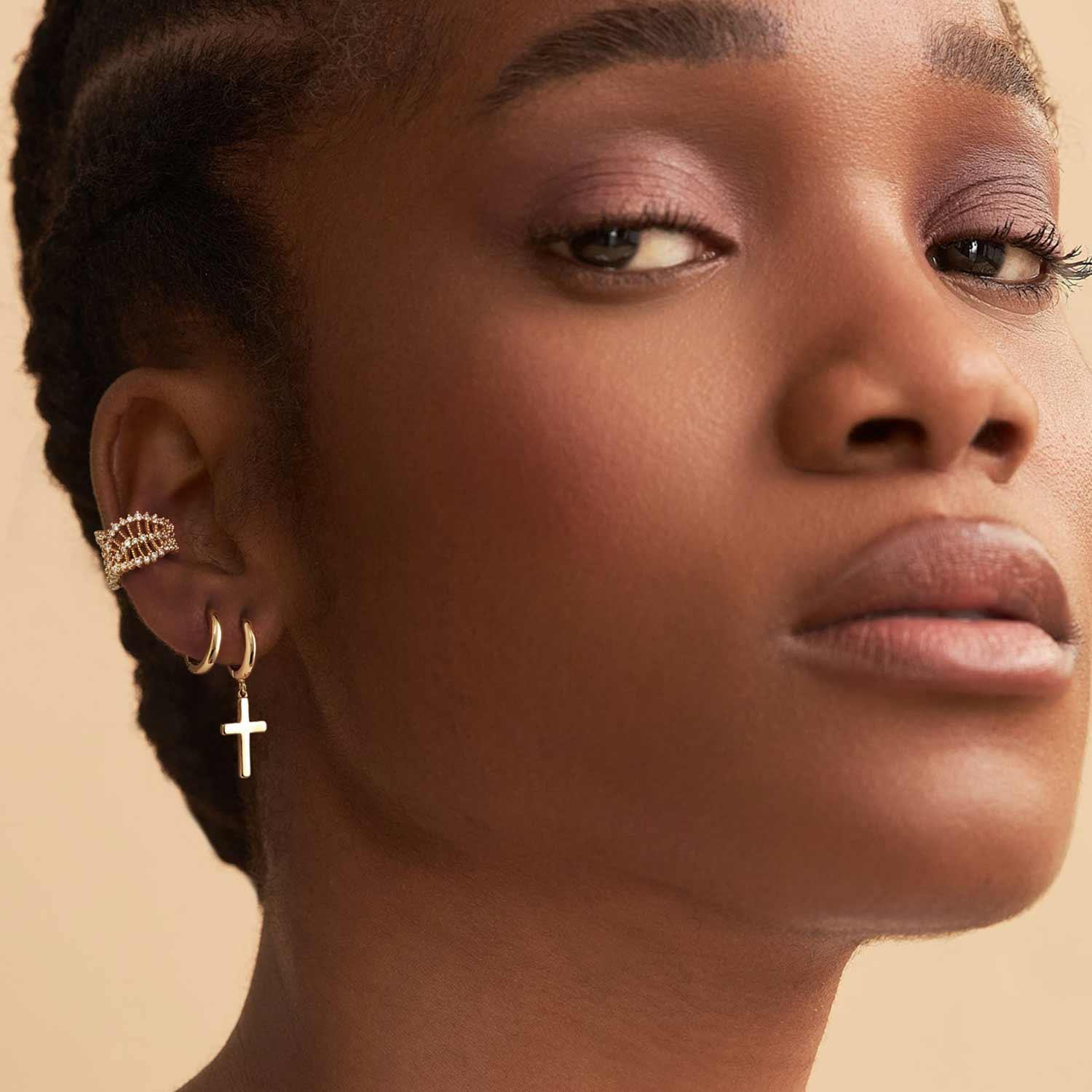 Close-up of MYEARS® Cross Drop Dangle Hoop Earrings, gold cross hoop design for women