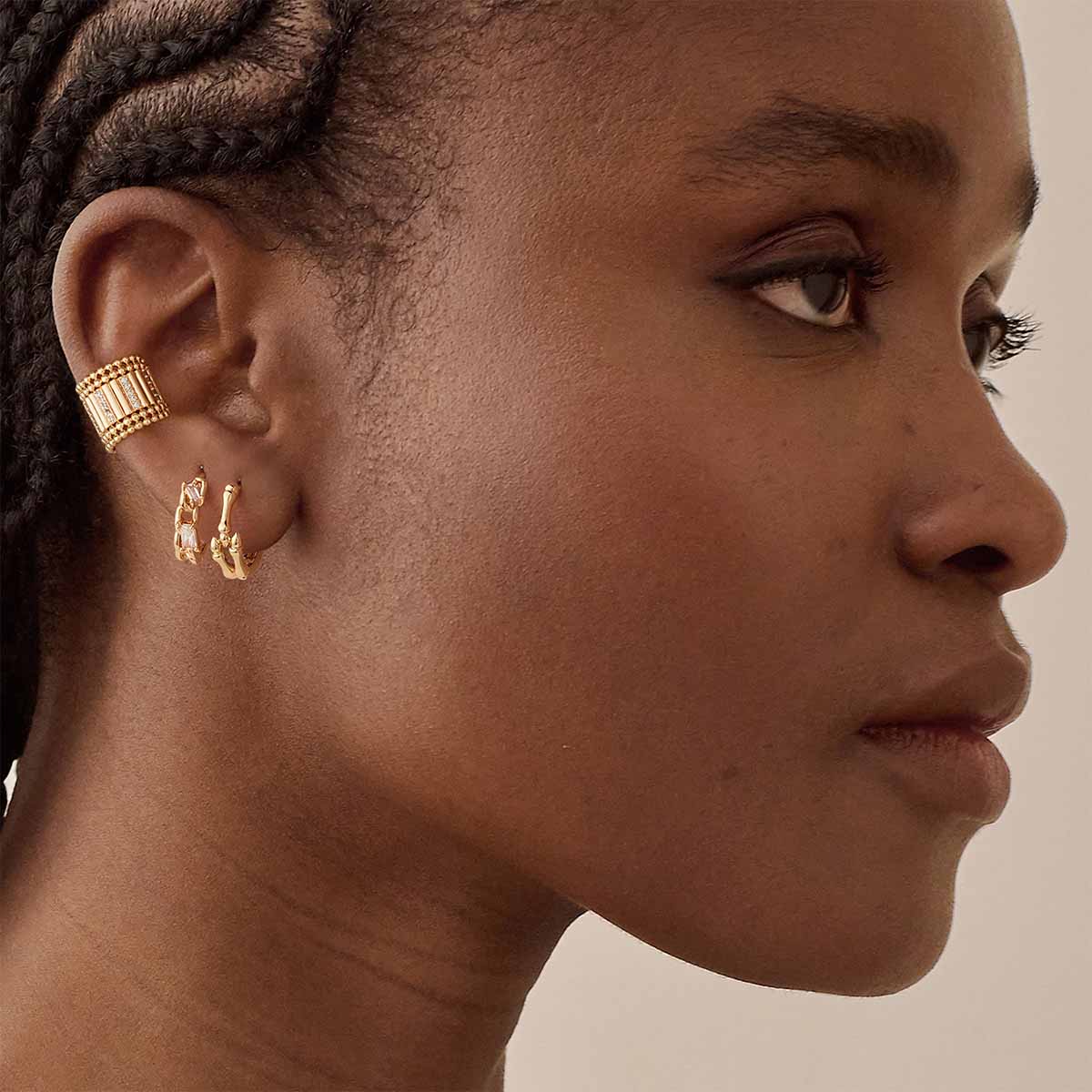 Woman wearing MYEARS® CZ Chain Link Hoop Earrings in gold, elegant chain link design ideal for daily wear and gifting