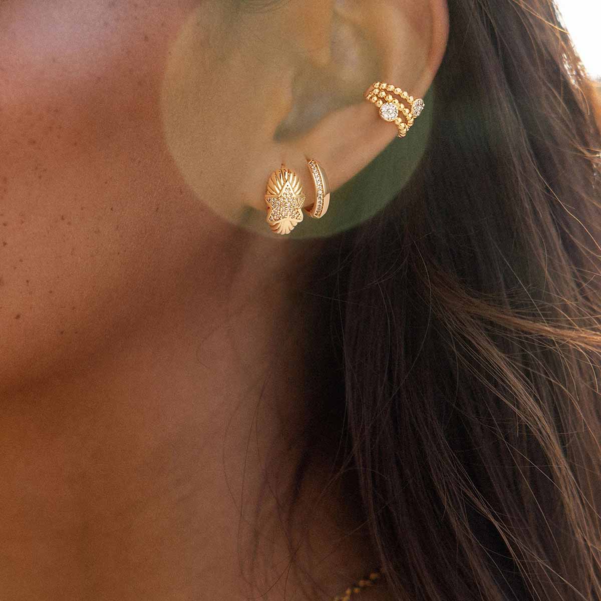 Close-up view of MYEARS® CZ Star Hoop Earrings in gold on model, highlighting the cubic zirconia star detail