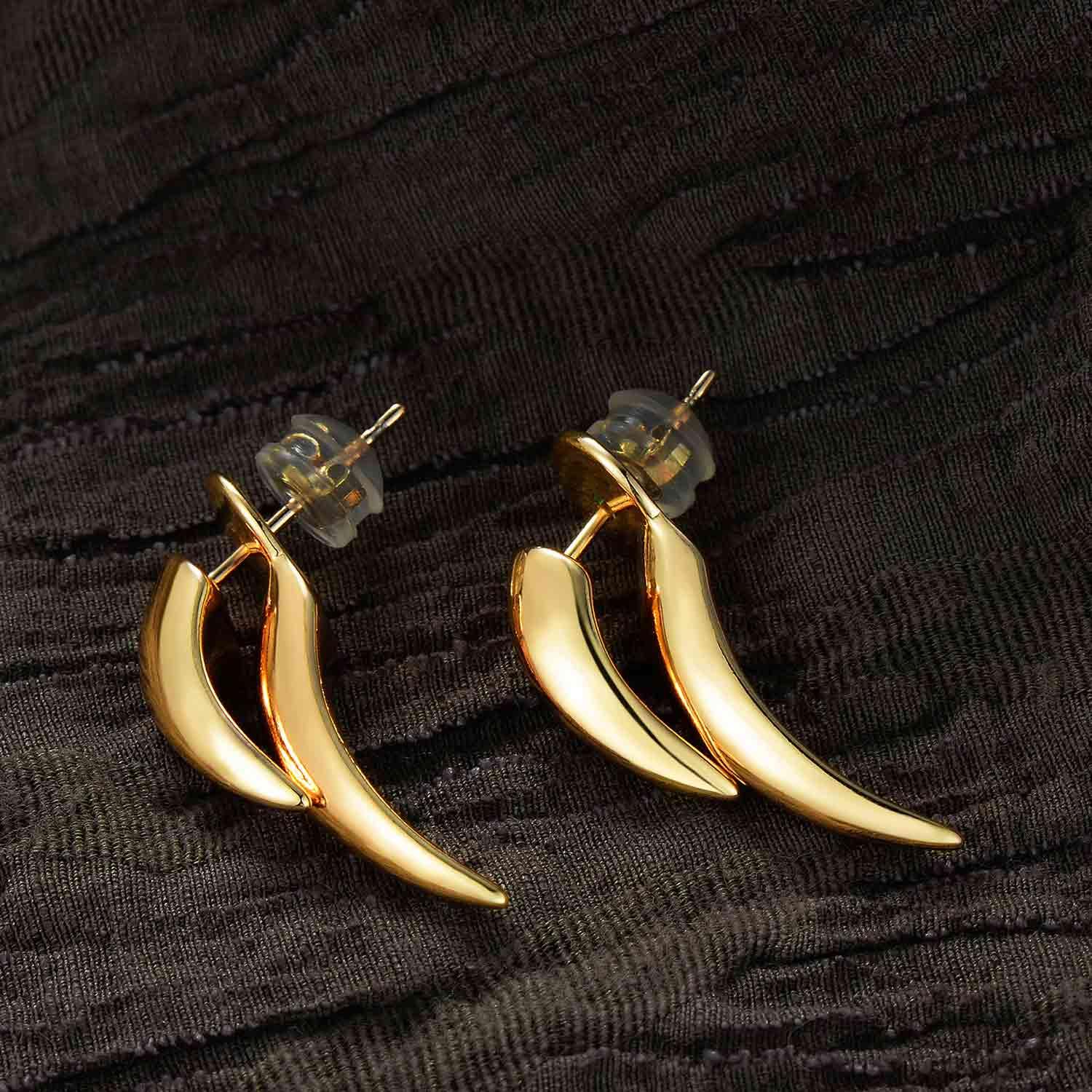 Detailed close-up of MYEARS Curved Spike Drop Stud Earrings, highlighting gold finish and unique spike design
