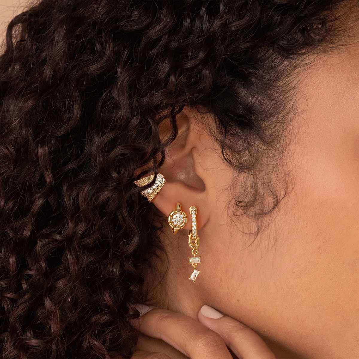 Close-up of MYEARS® CZ hoop dangle earrings in gold on model, highlighting the sparkling cubic zirconia accents