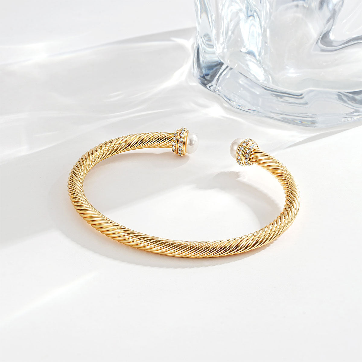 Detailed view of the Myears® gold twisted open cuff bracelet showing the open adjustable design and twisted metal texture.