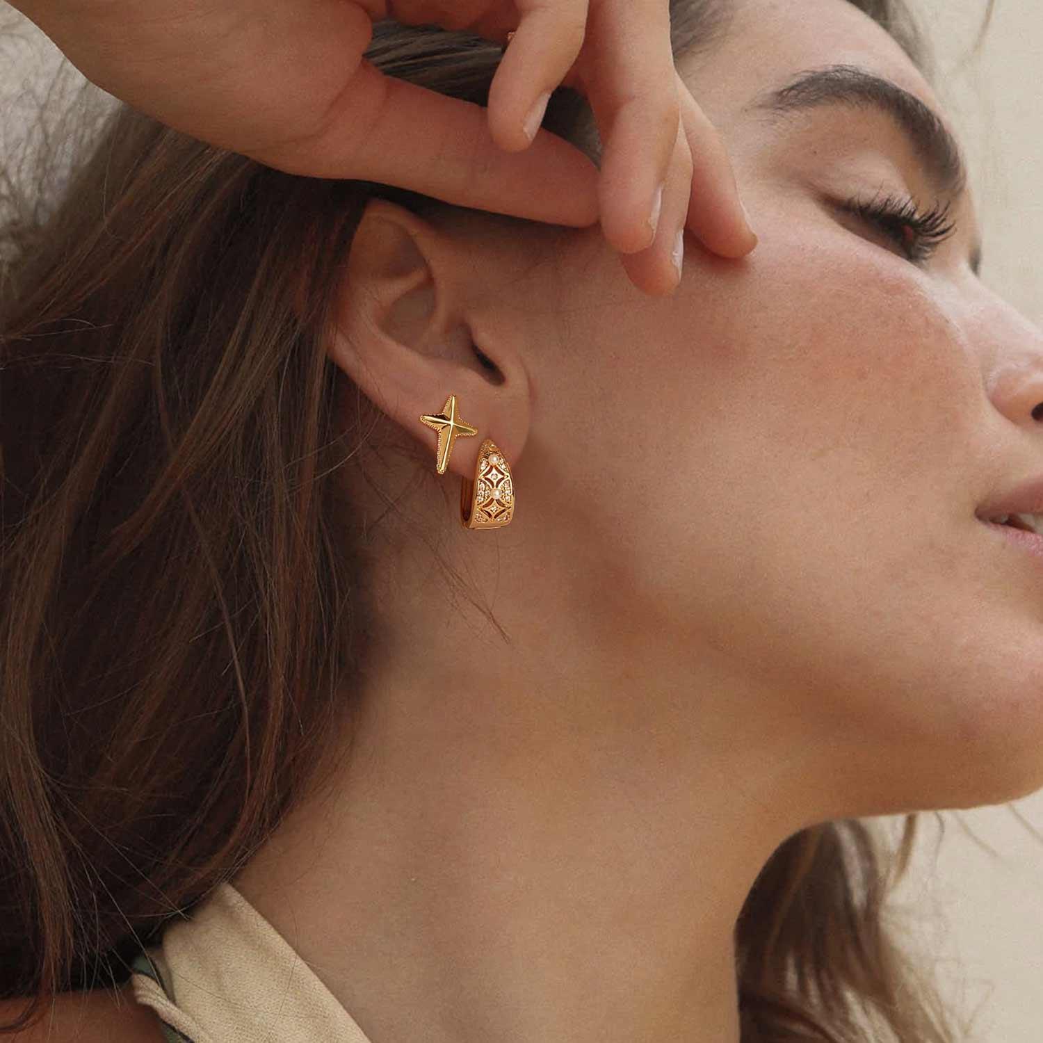 Model wearing MYEARS® pearl huggie hoop earrings, elegant everyday pearl hoop earrings for women.