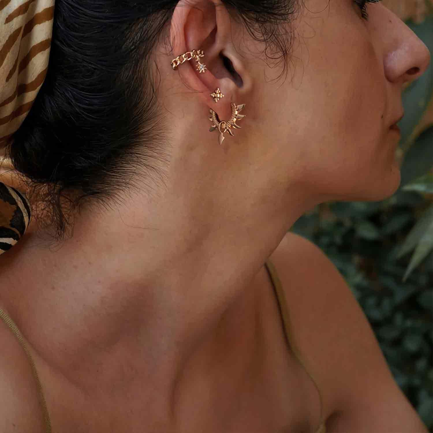 MYEARS® spike huggie hoop earrings close-up, gold spiked hoops for women, stylish accessory