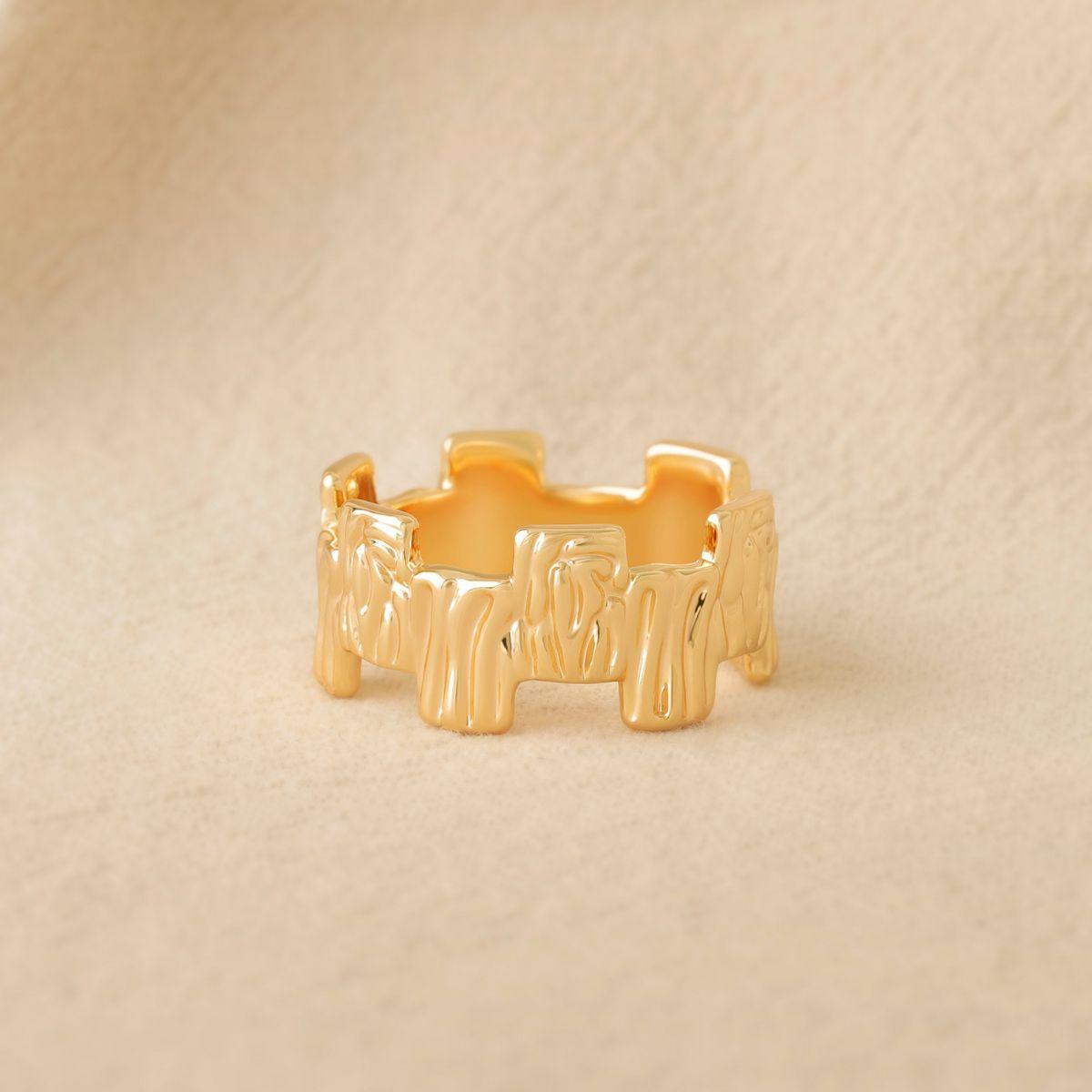 Close-up detail of MYEARS gold tree personalized bar ring