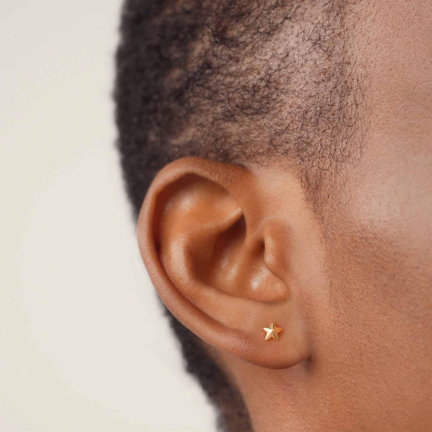 Model wearing MYEARS® Star Stud Earrings Set, stylish gold geometric studs for women, perfect for everyday wear or gifting.