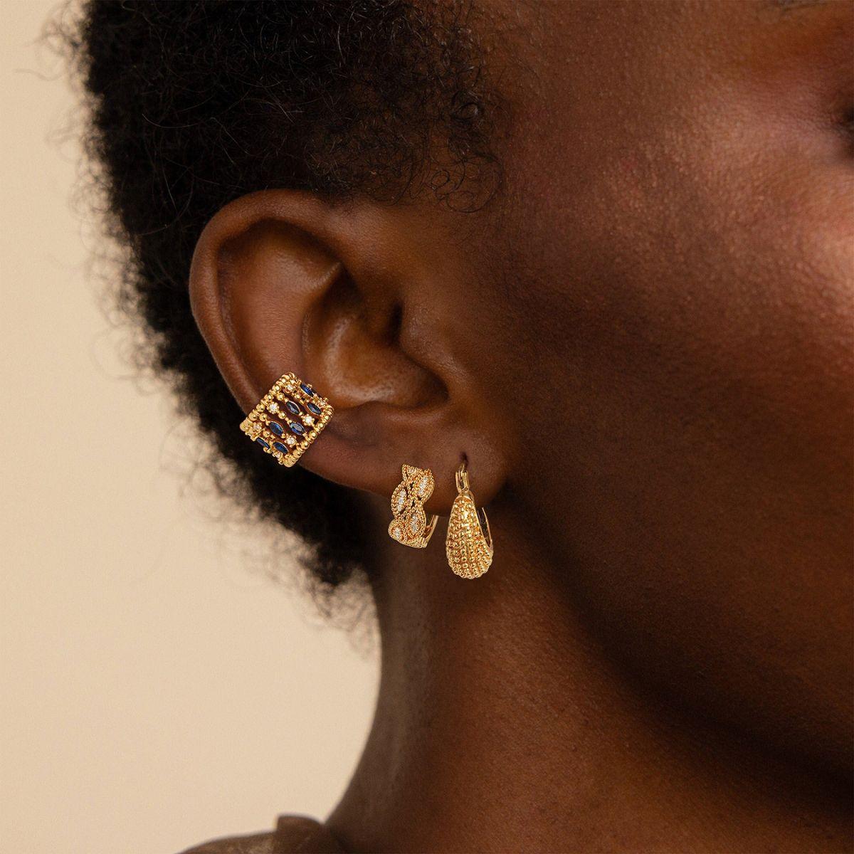 Close-up of a model wearing MYEARS® beaded chain ear cuffs, showing the delicate gold beaded chain and comfortable no piercing fit
