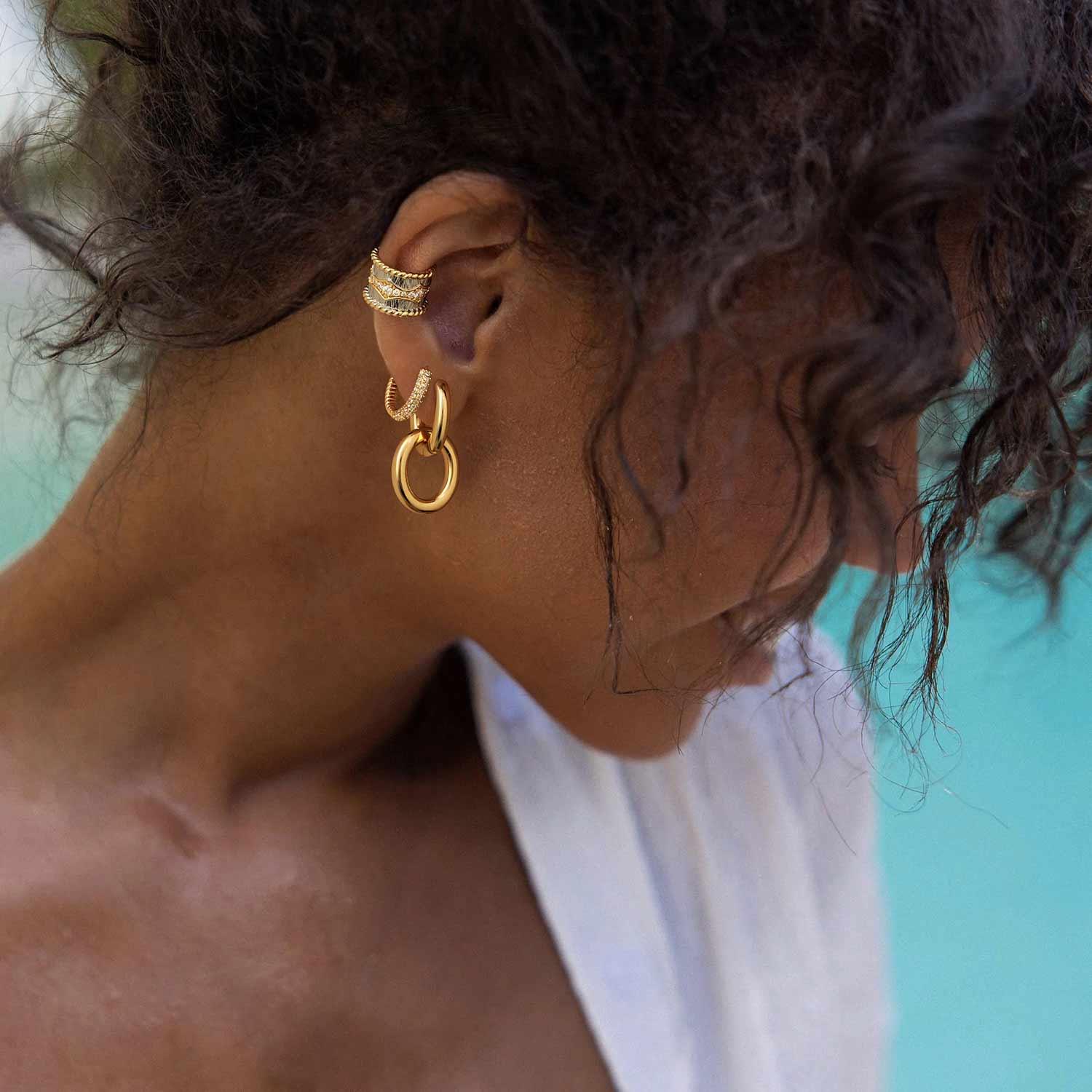 Lifestyle view of MYEARS® Link Huggie Hoop Dangle Earrings, highlighting versatile gold earrings suitable for everyday wear and gifting