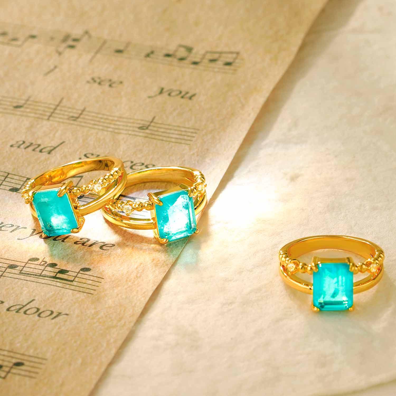 Rectangle Simulated Emerald/Paraiba Solitaire Cocktail Ring