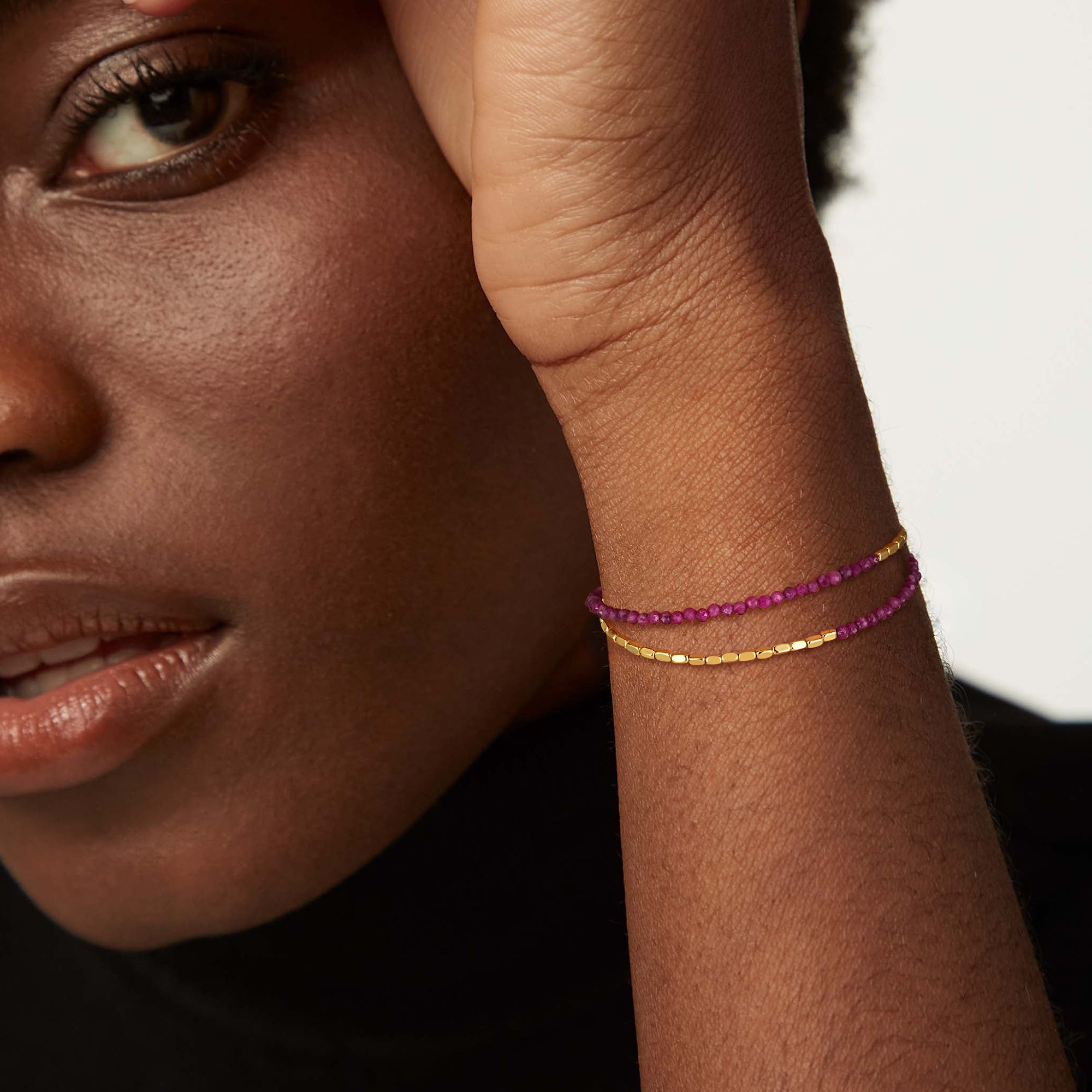 Model wearing the Myears® Carnelian Square Chain Double-Layer Bracelet, 14k gold-plated chain, close-up portrait
