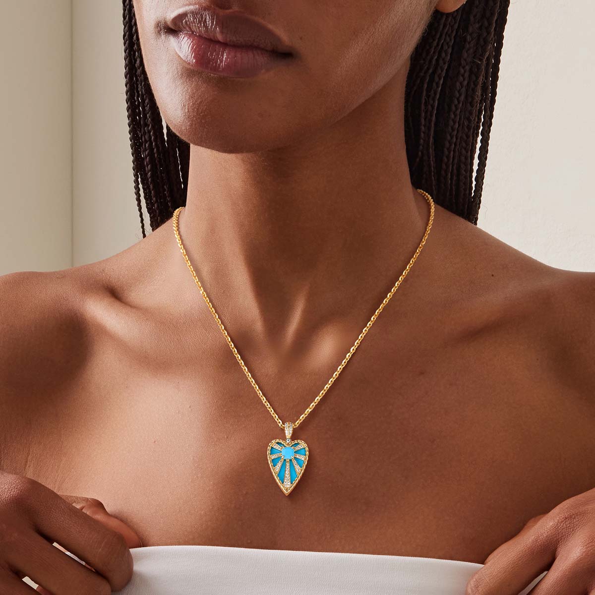 Gold Natural Stone Heart Pendant Necklace with Turquoise worn by model with full outfit