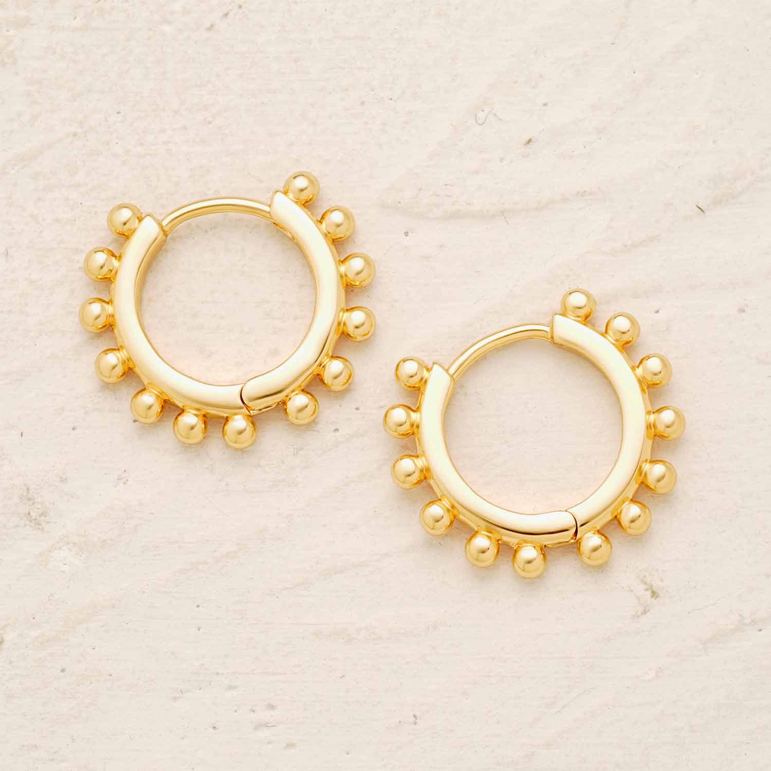 Close-up of MYEARS® Gold Round Beaded Hoop Earrings showing gold finish and round bead detailing