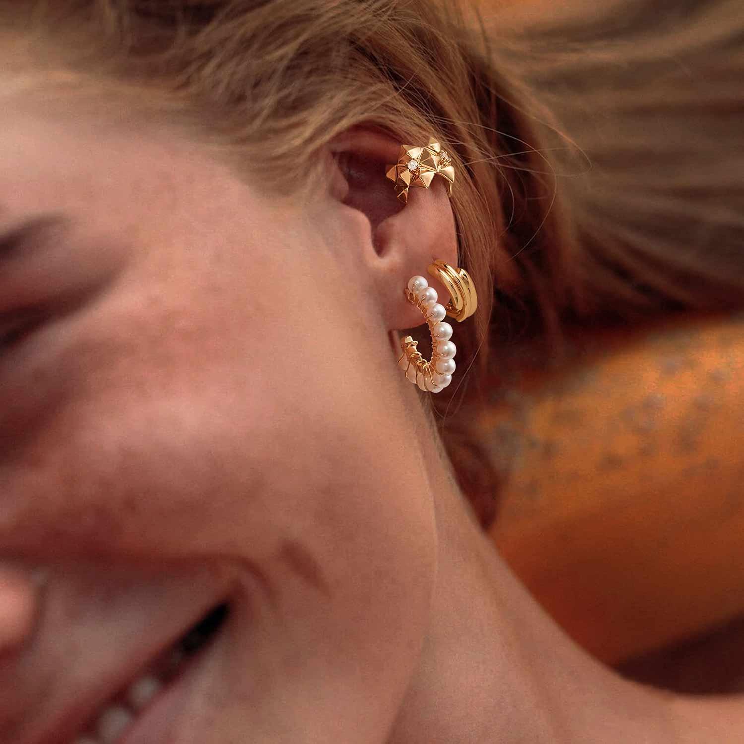 Gold Sun Pearl Beaded Huggie Earrings worn by model, stylish everyday hoop earrings for women, ideal gift for loved ones