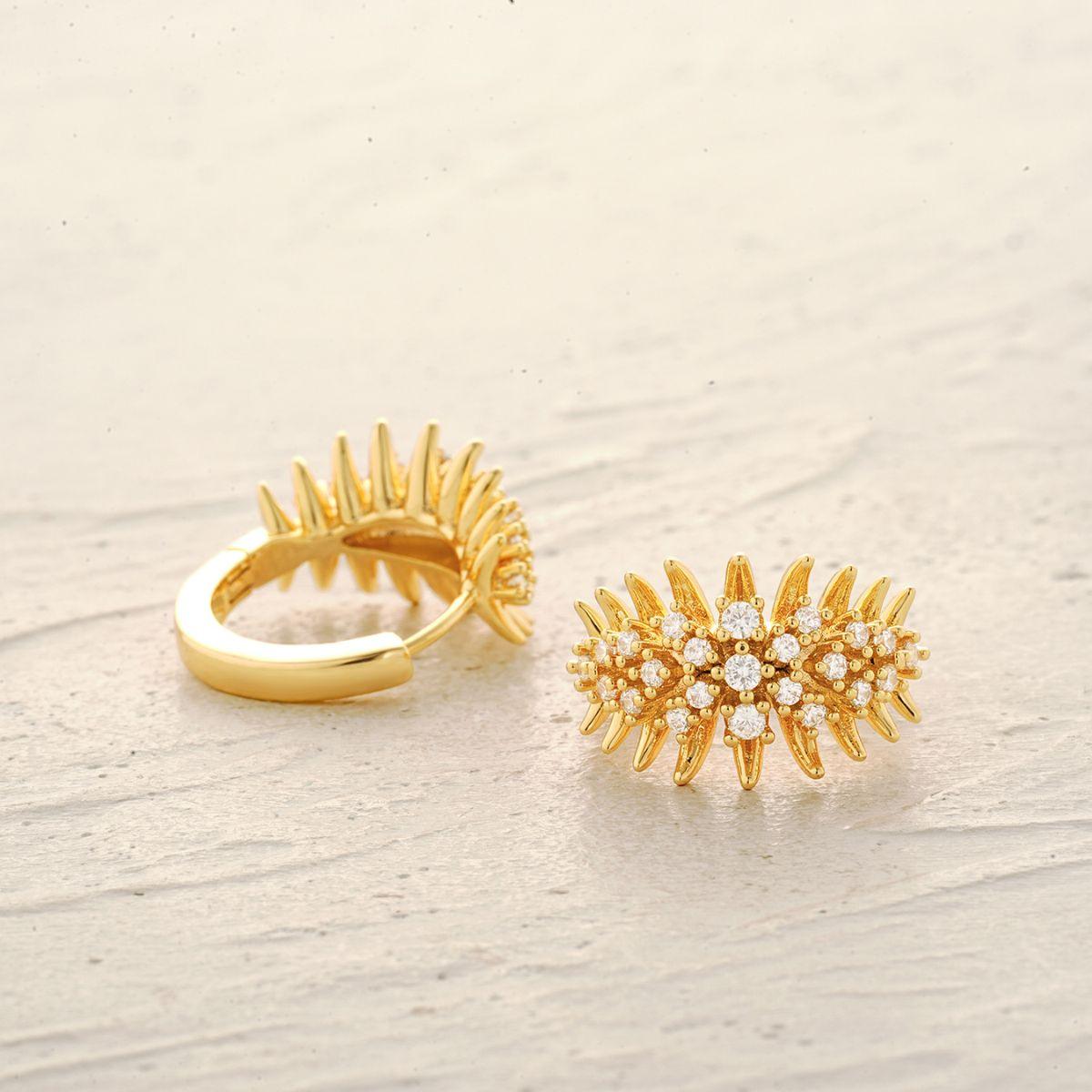 Detailed view of MYEARS® Anemone Pearl Huggie Hoop Earrings highlighting gold finish and pearl craftsmanship