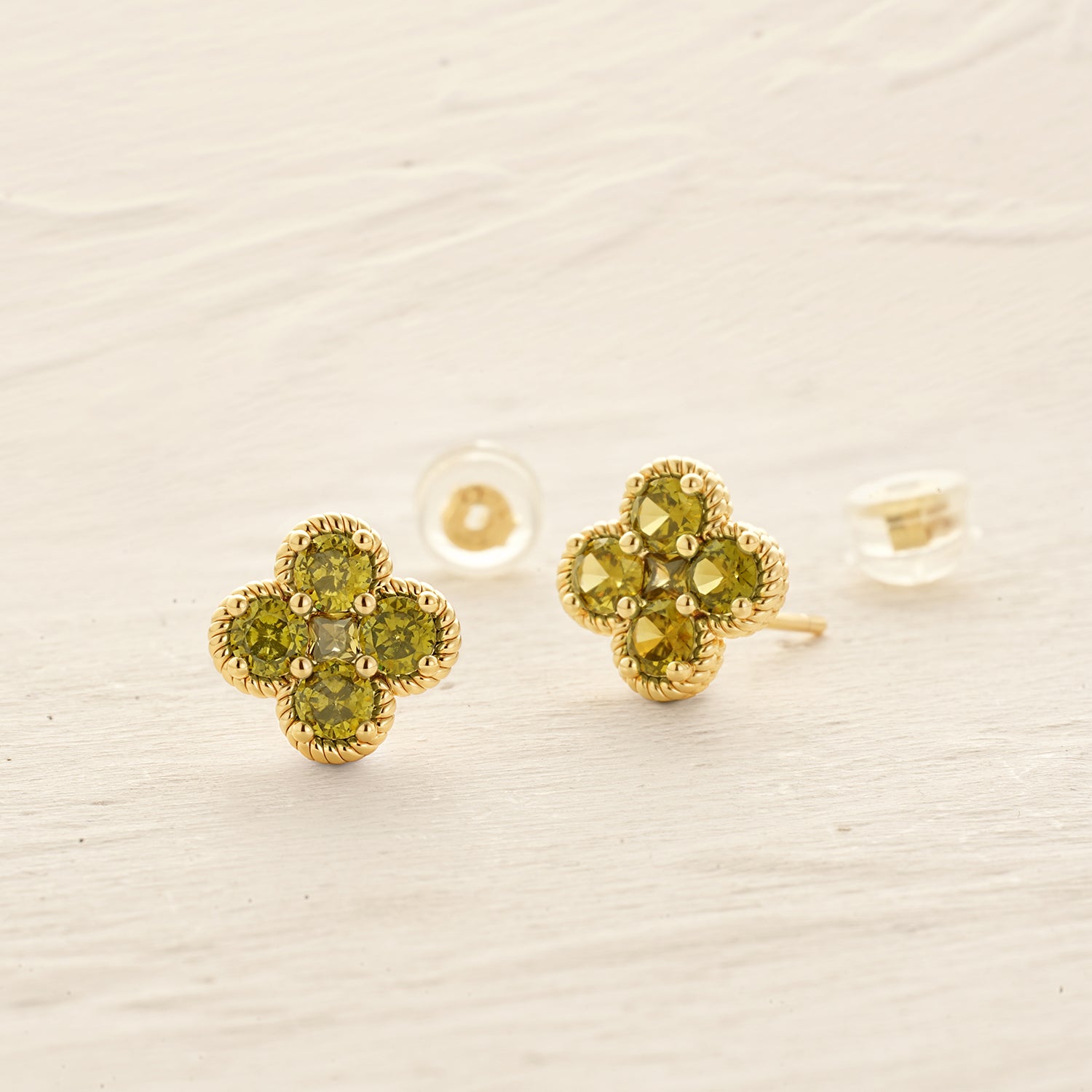 Close-up of MYEARS August Flower Birthstone Stud Earrings in gold showing elegant design, women’s lucky charm for everyday wear