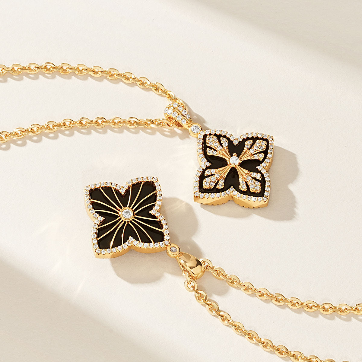 Close-up of MYEARS Black Onyx Four Leaf Clover Pendant Necklace in gold showing elegant design, women’s lucky charm for everyday wear