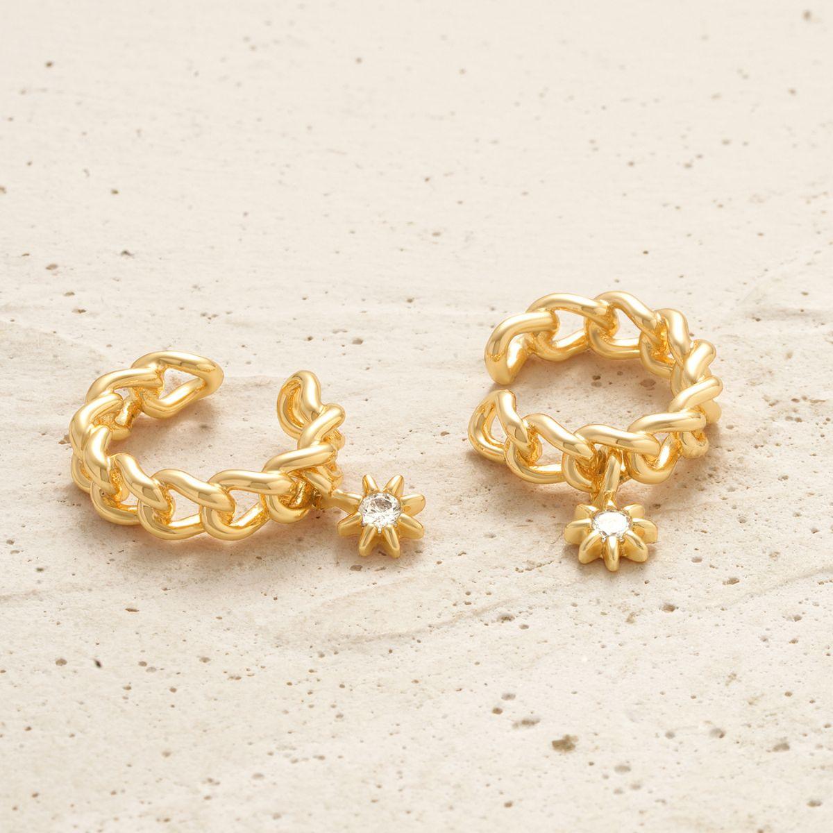 Detailed view of MYEARS® Chain Ear Cuff with Starburst Dangle, featuring a delicate gold chain and sparkling starburst charm, perfect for women looking for elegant and unique jewelry