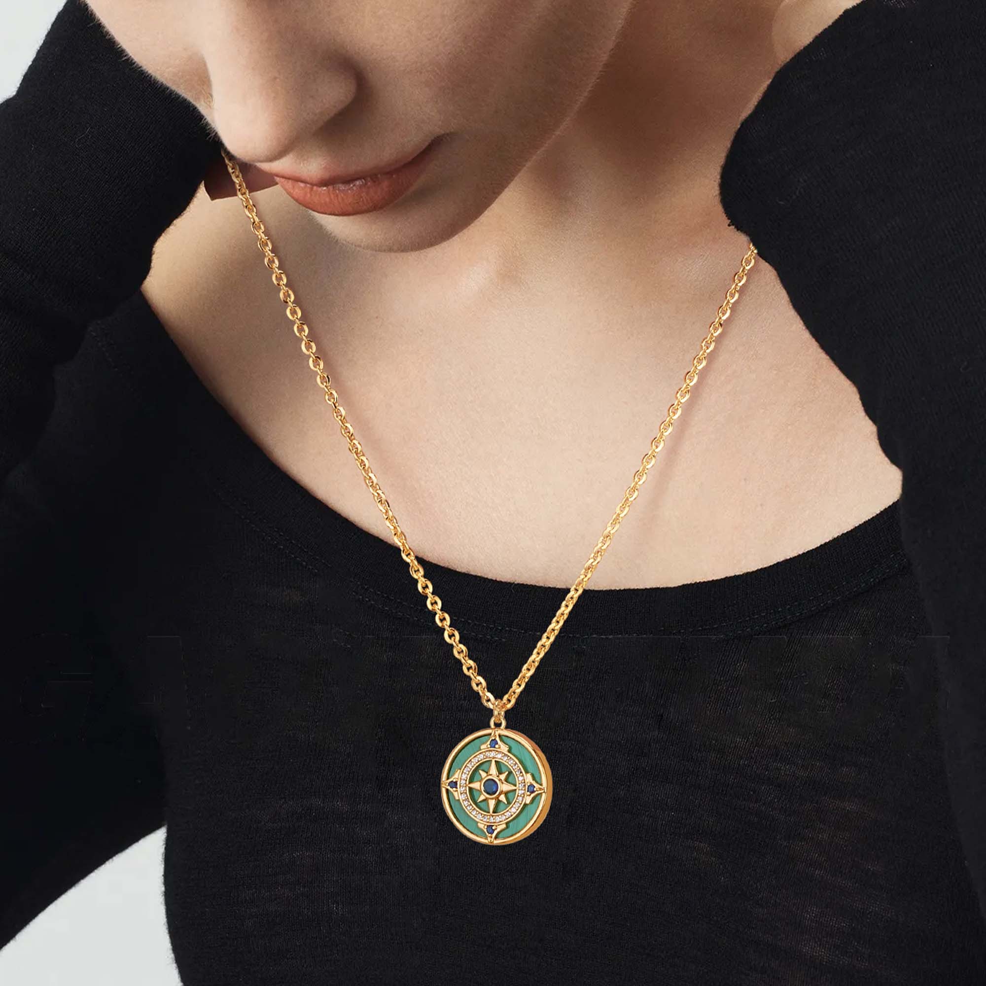 Model wearing MYEARS Compass Malachite Pendant Necklace in gold, stylish compass-shaped malachite necklace for women