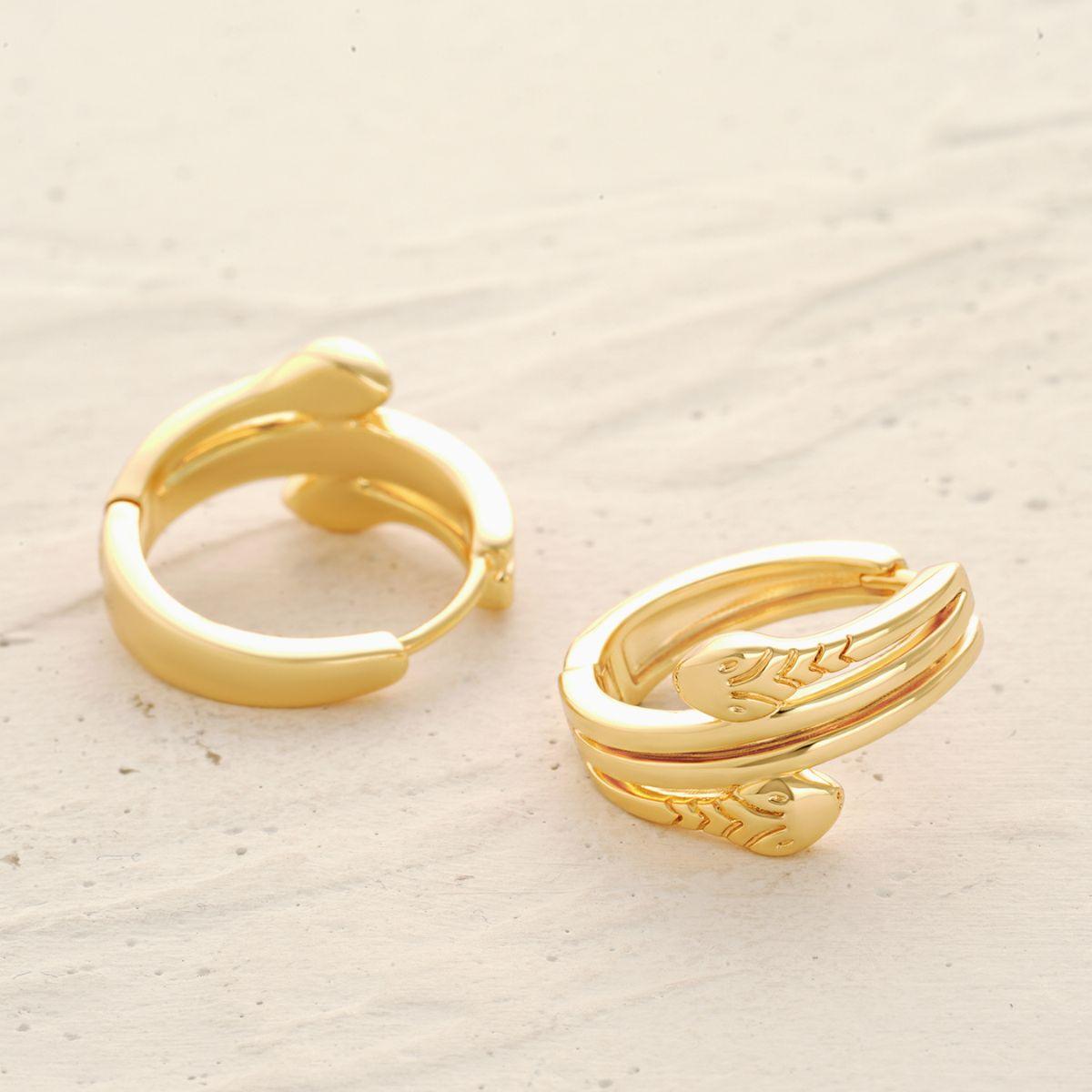 Close-up of MYEARS® Double Snake Hoop Earrings worn by a woman, showcasing the double snake design and polished gold finish
