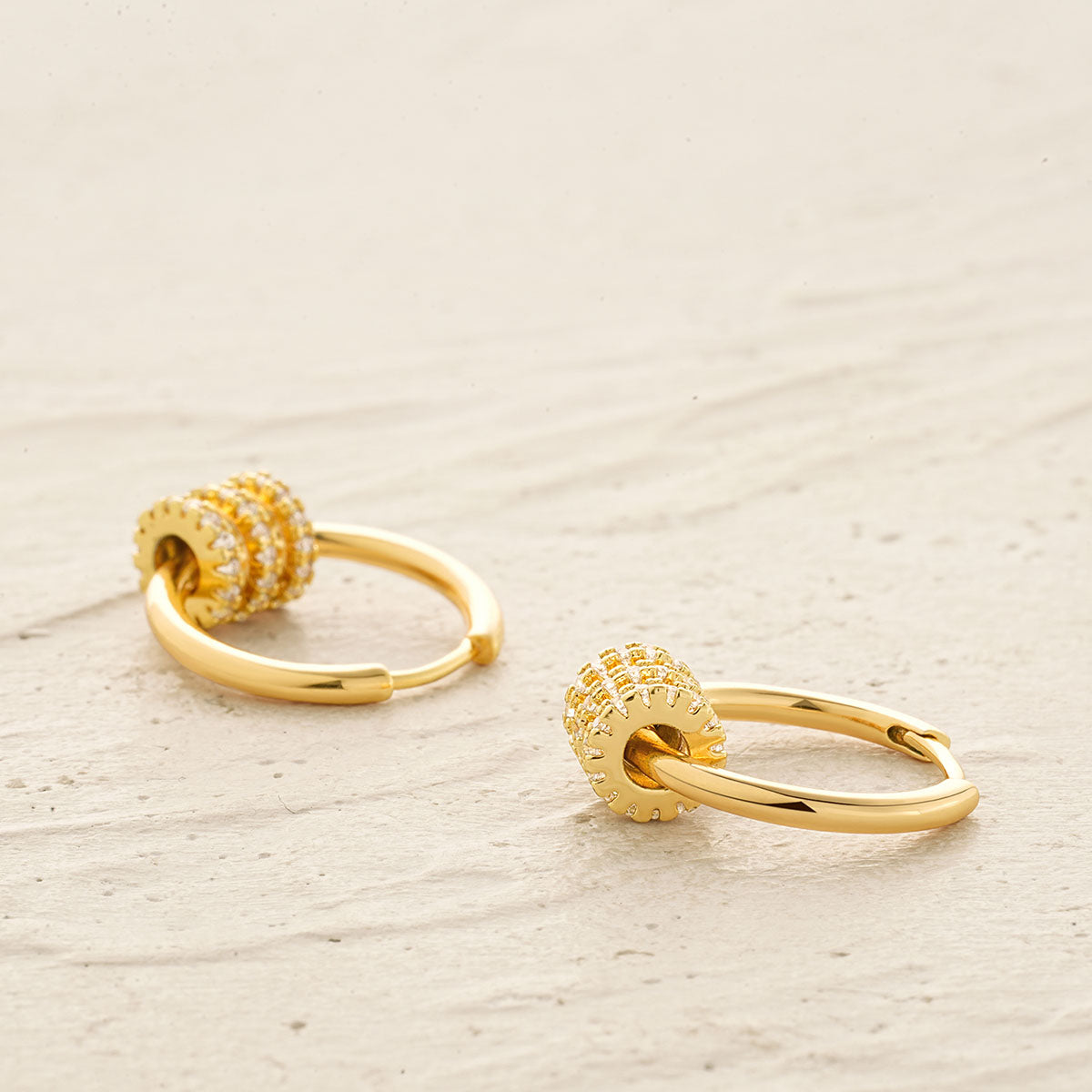 Detailed view of MYEARS® Gear Bead Dangle Hoop Earrings in gold, highlighting bead details, craftsmanship, and polished finish