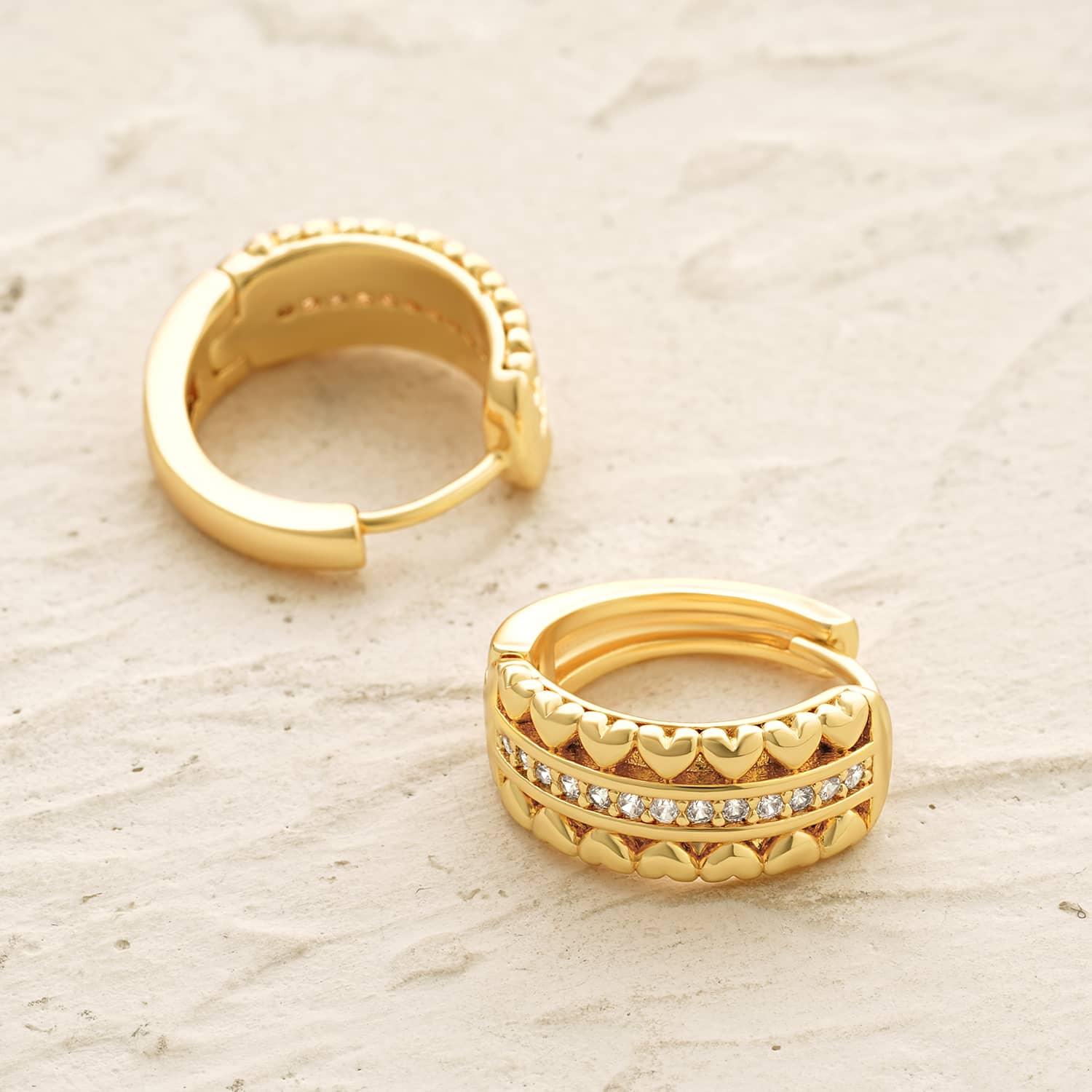 Close-up detail of MYEARS Heart Row Edge Hoop Earrings showing heart edge design in gold