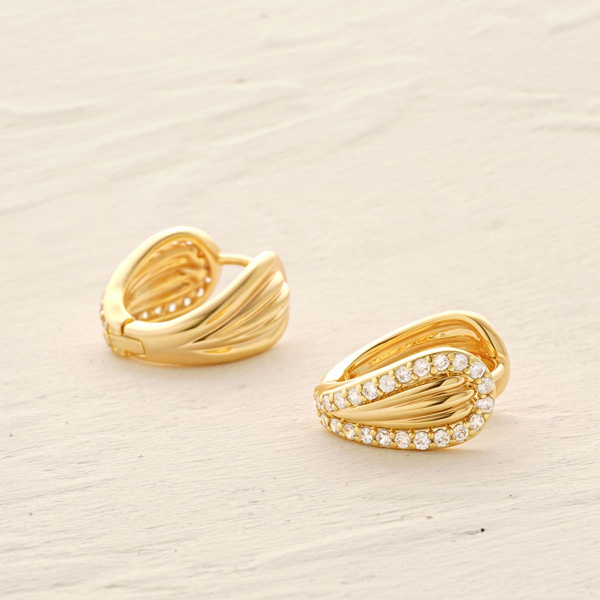 Detailed scene of MYEARS® CZ Mermaid Tail Huggie Hoop Earrings in gold, focusing on the mermaid tail motif