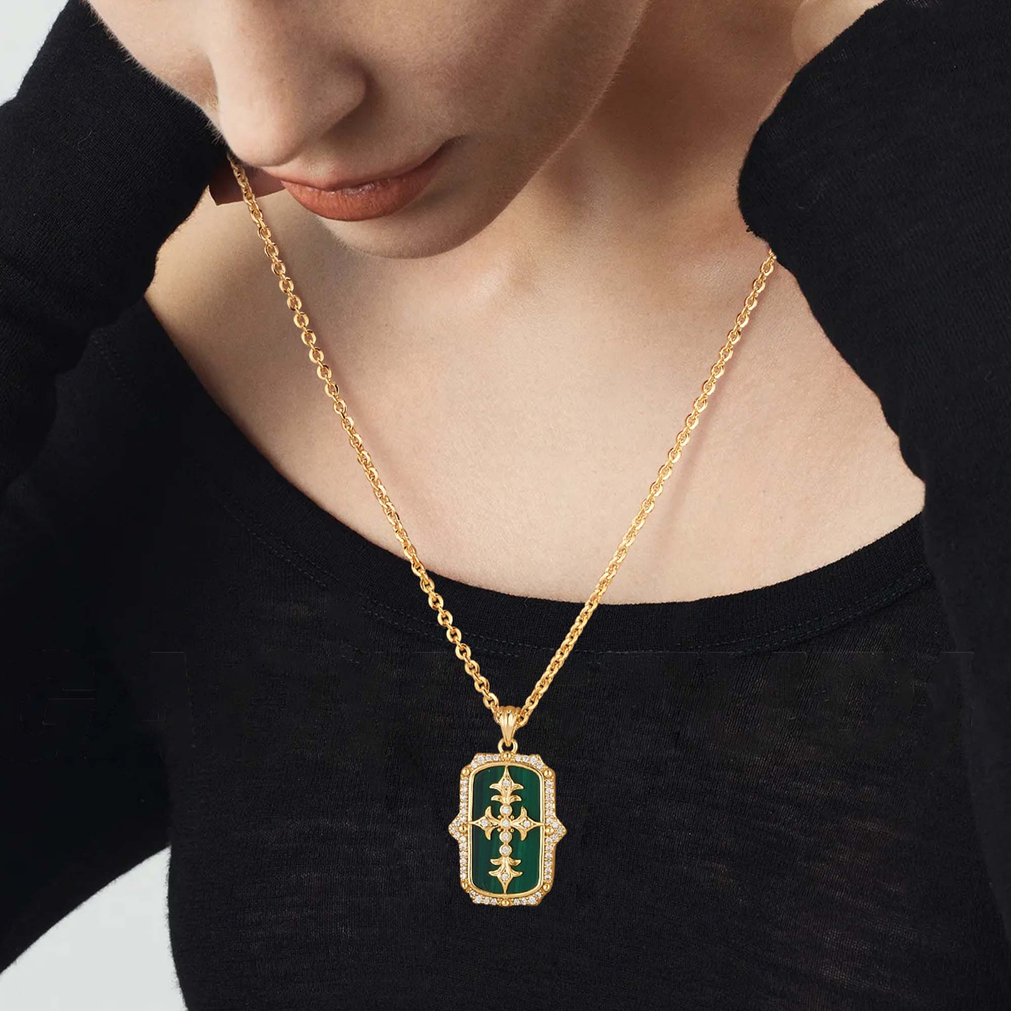 Model wearing MYEARS Iris Malachite Pendant Necklace in gold, stylish iris-shaped malachite necklace for women