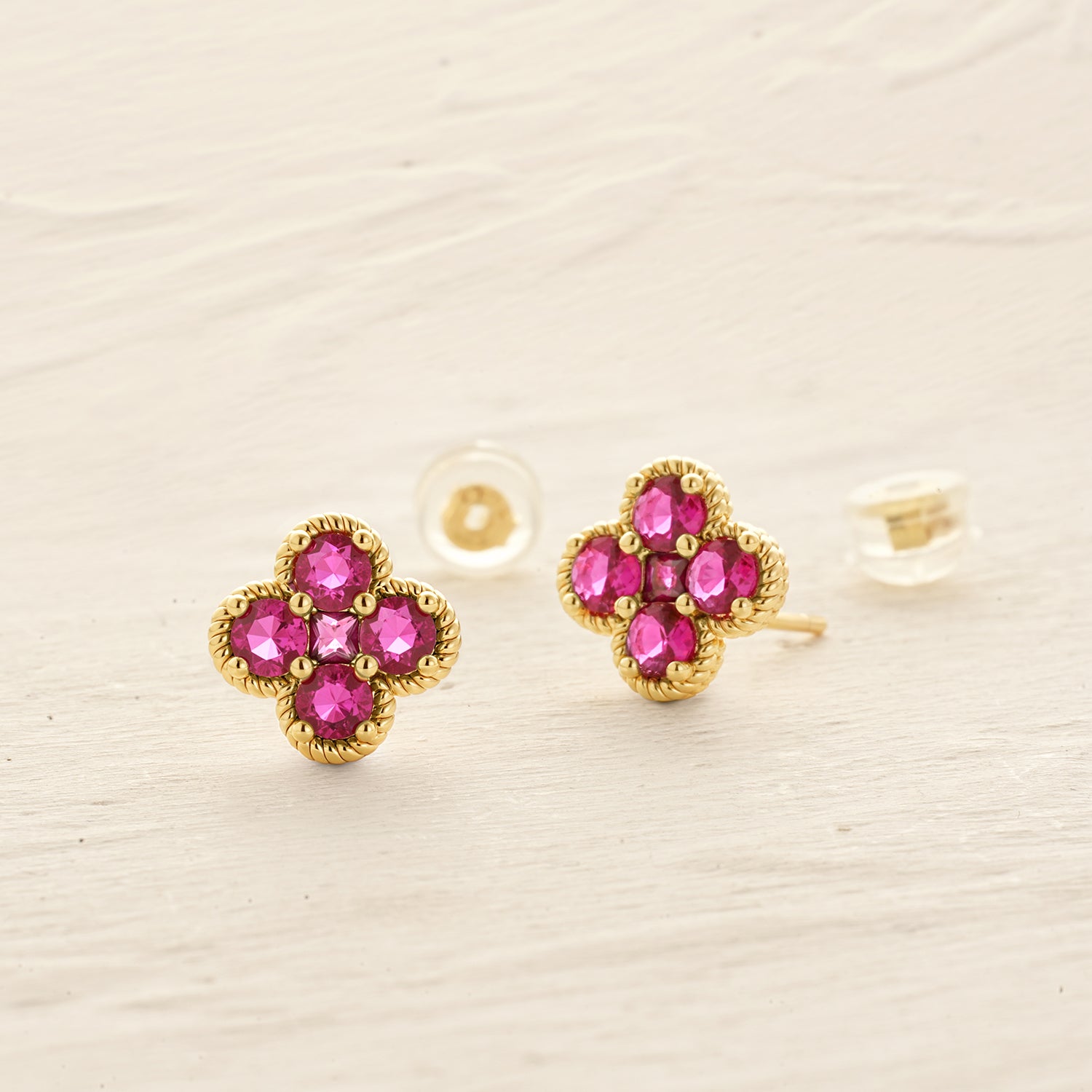 Close-up of MYEARS July Flower Birthstone Stud Earrings in gold showing elegant design, women’s lucky charm for everyday wear