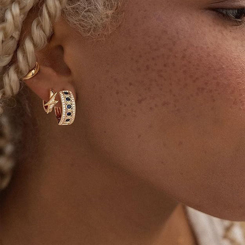 Lifestyle view of MYEARS® Lightning Bolt Hoop Earrings in gold, suitable for gifting or adding a trendy touch to everyday outfits