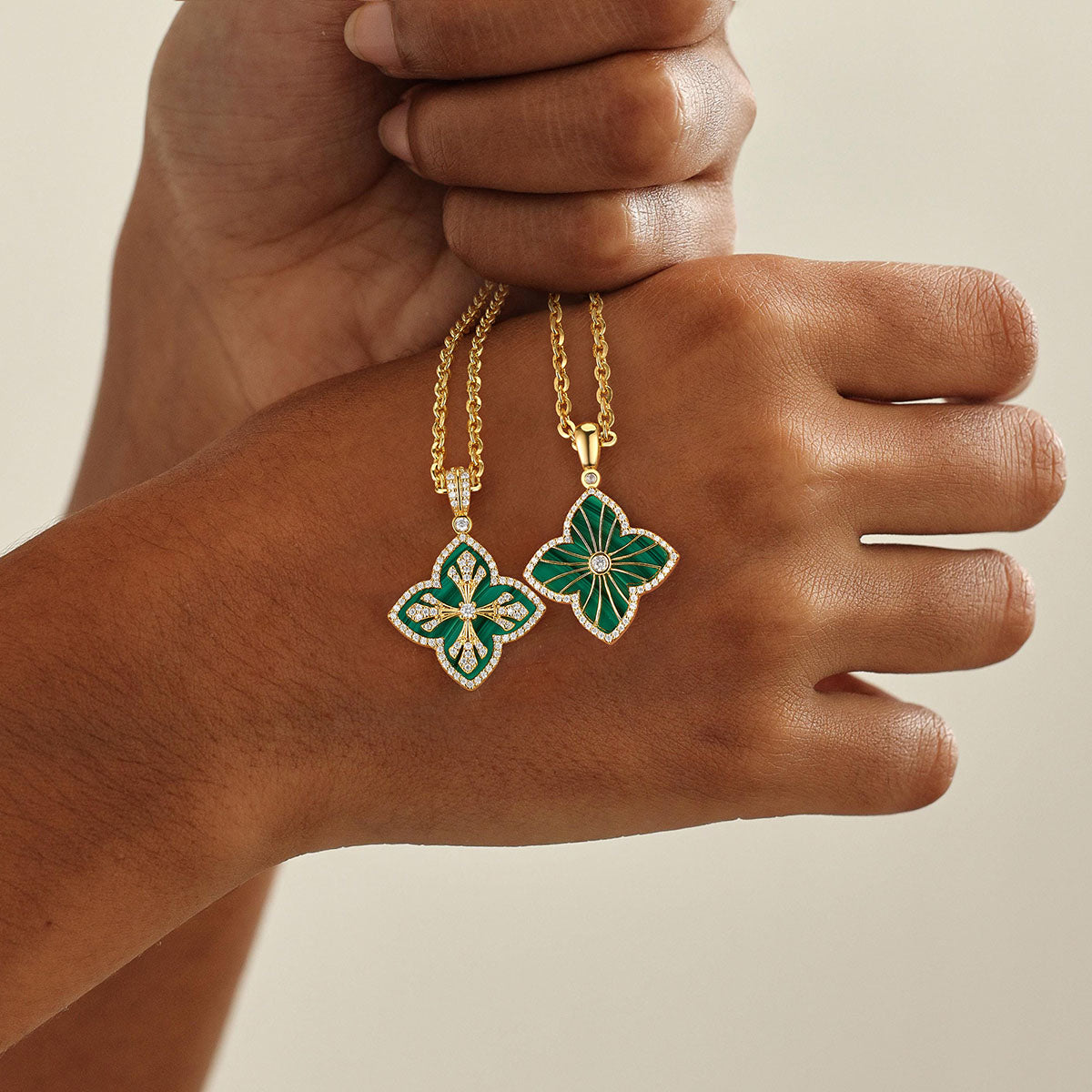 Model wearing MYEARS Malachite Four Leaf Clover Pendant Necklace in gold, elegant and lucky design for women, perfect for everyday wear