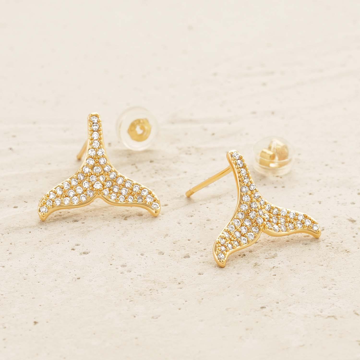 Detailed view of MYEARS® mermaid tail stud earrings showing the tail shape and gold finish craftsmanship.