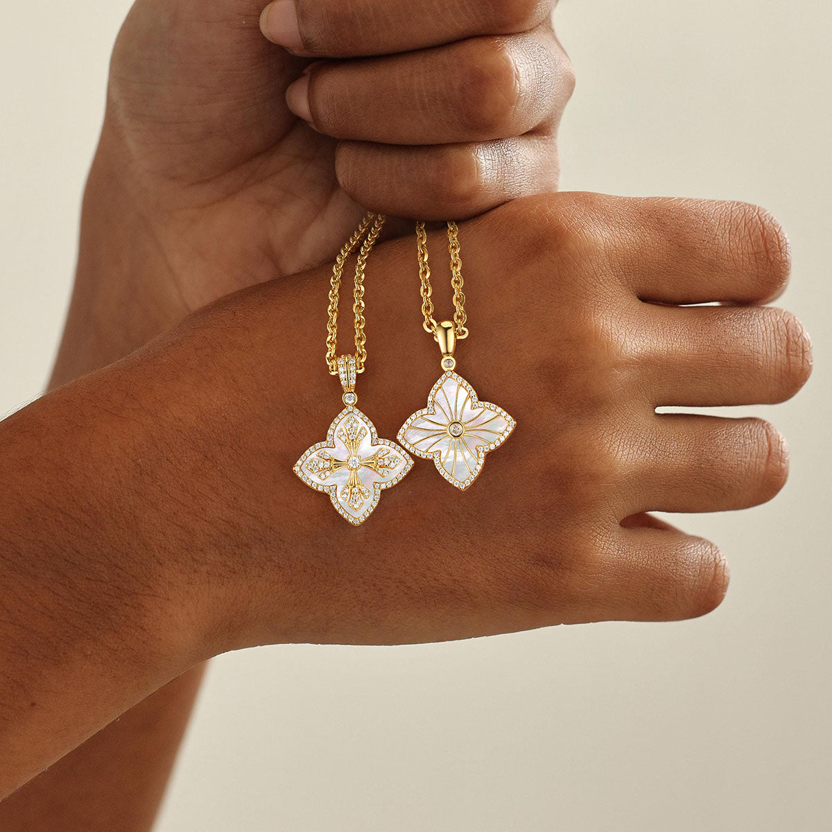 Model wearing MYEARS Mother of Pearl Four Leaf Clover Pendant Necklace in gold, elegant and lucky design for women, perfect for everyday wear