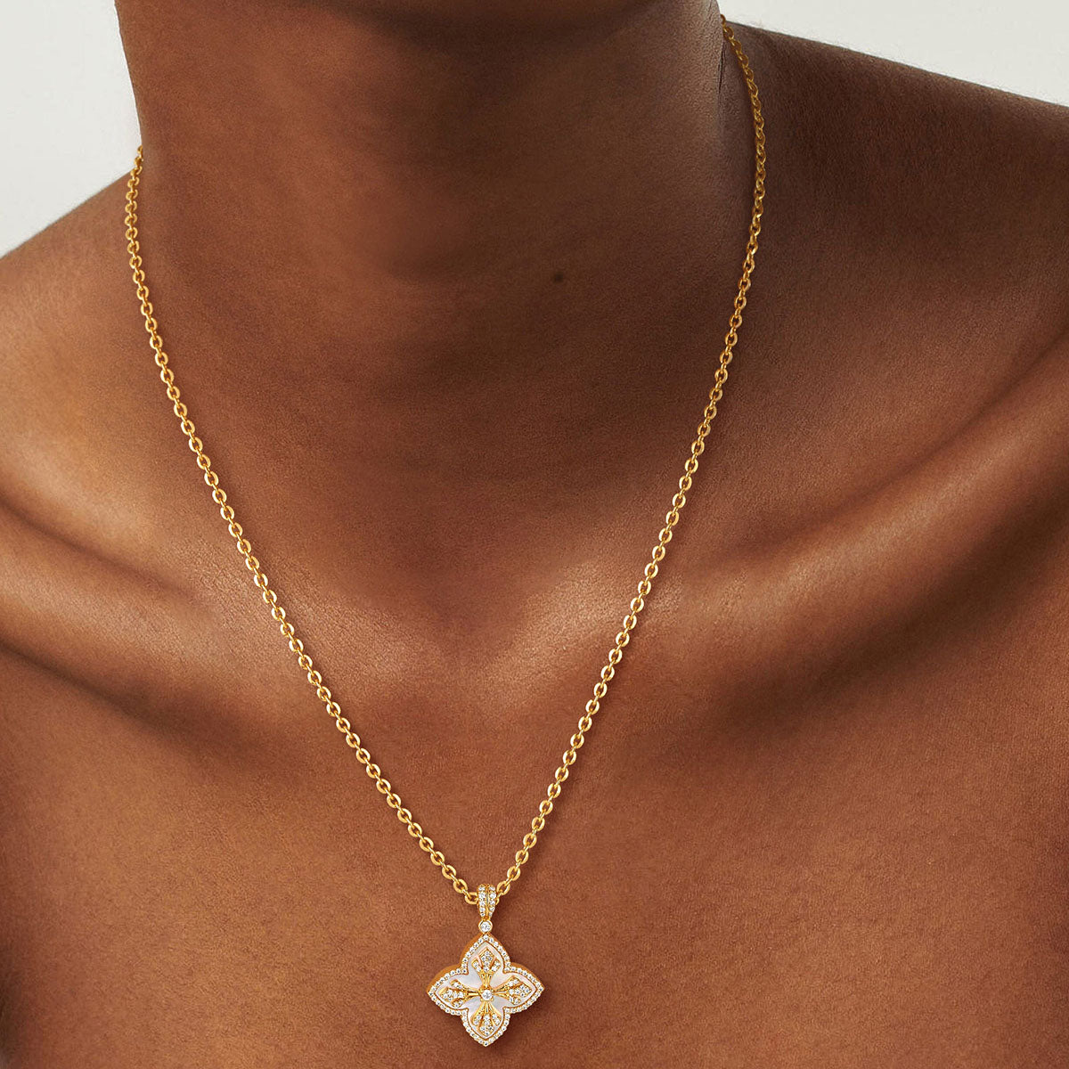 MYEARS Mother of Pearl Four Leaf Clover Pendant Necklace in gold worn by woman, elegant and lucky necklace suitable for everyday wear