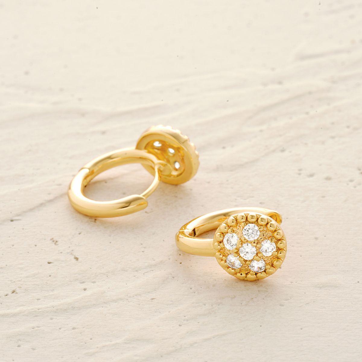 Detailed view of MYEARS® Pave Disc Hoop Earrings highlighting the gold finish and sparkling pave disc craftsmanship