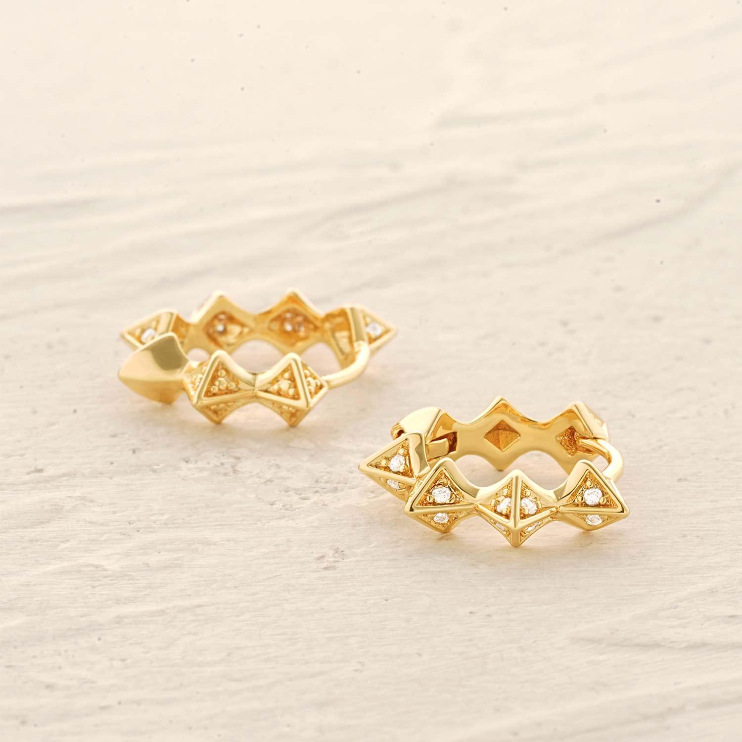 Detailed view of MYEARS® Pyramid Huggie Hoop Earrings in gold, showing geometric pyramid design