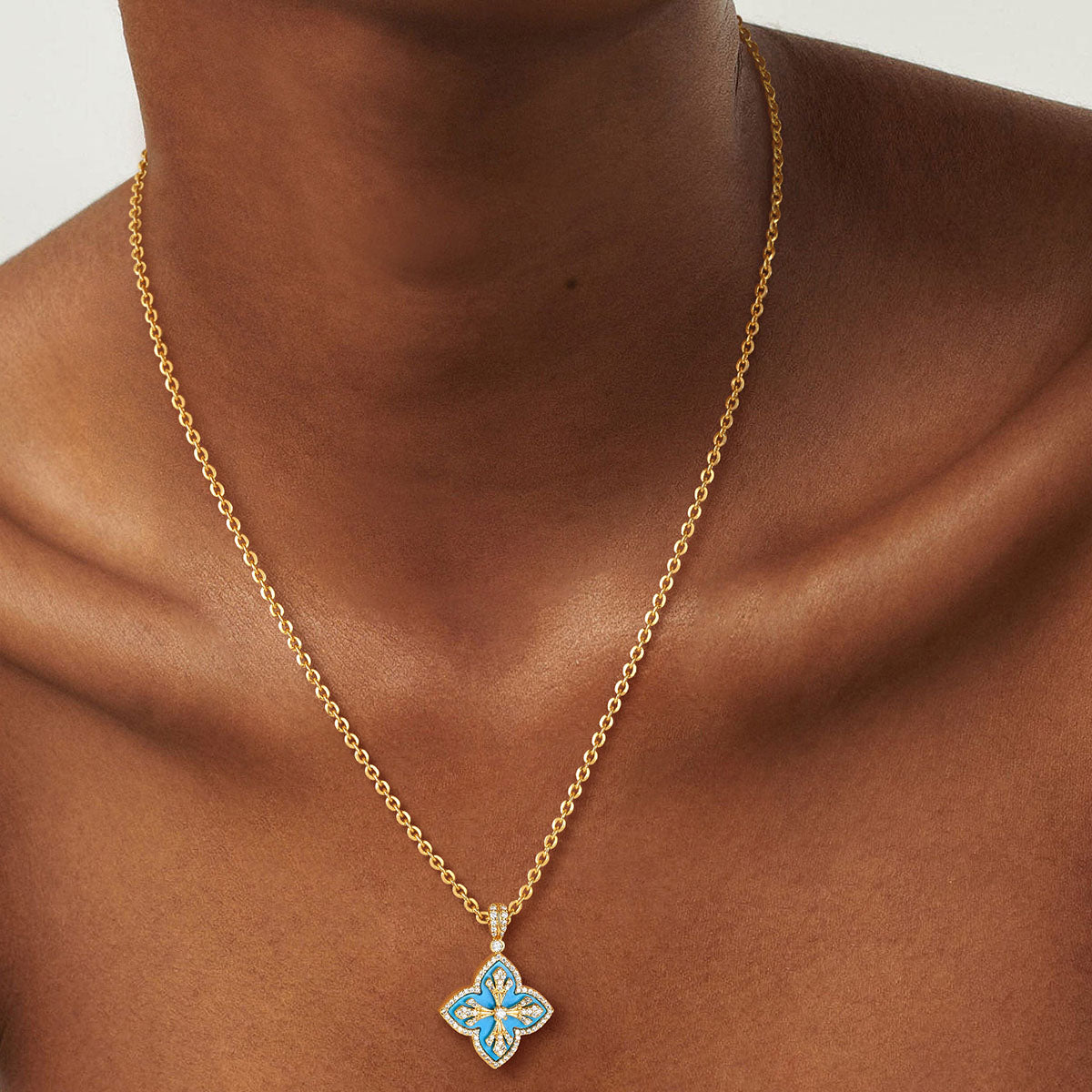 MYEARS Turquoise Four Leaf Clover Pendant Necklace in gold worn by woman, elegant and lucky necklace suitable for everyday wear